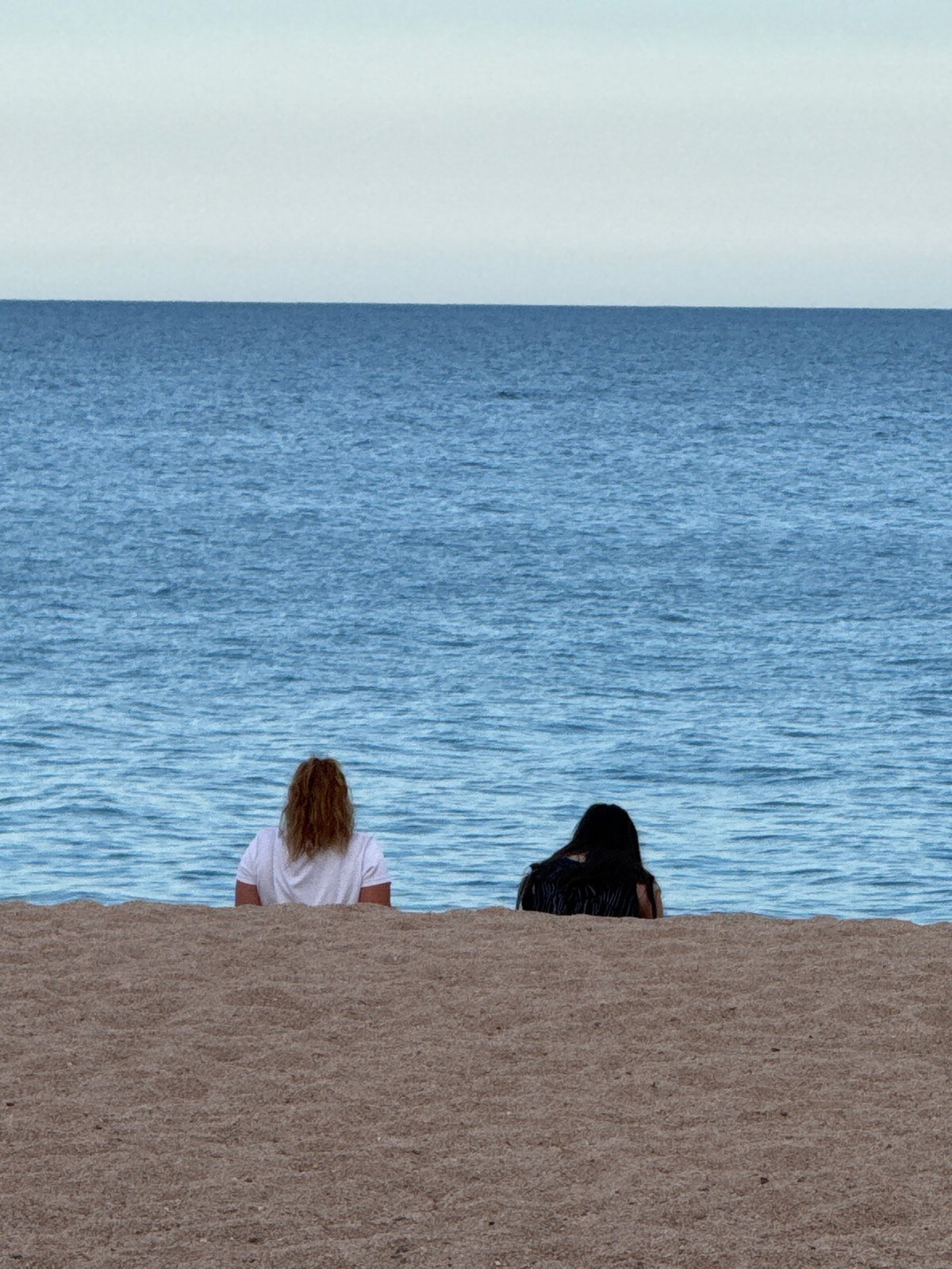 Lazy summer afternoon on Blanes beach and promenade