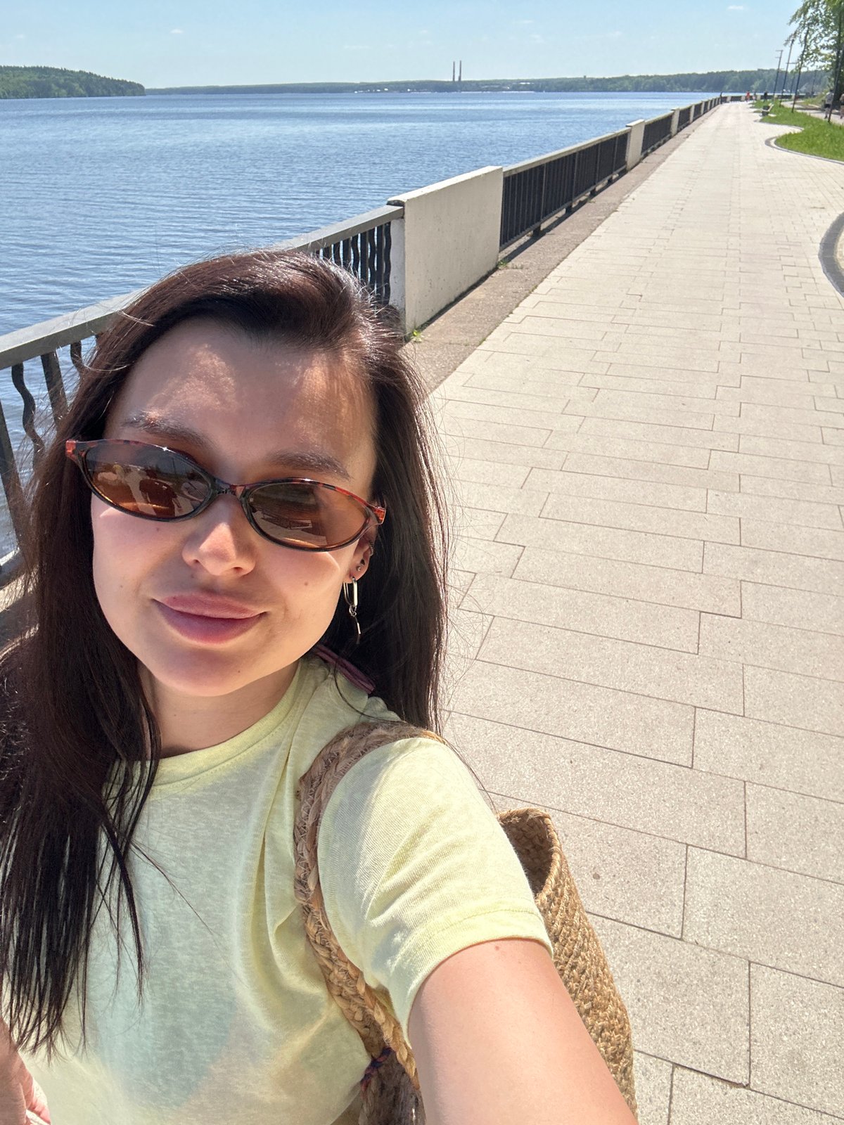 Woman enjoys morning beach visit in Chaikovsky, Russia
