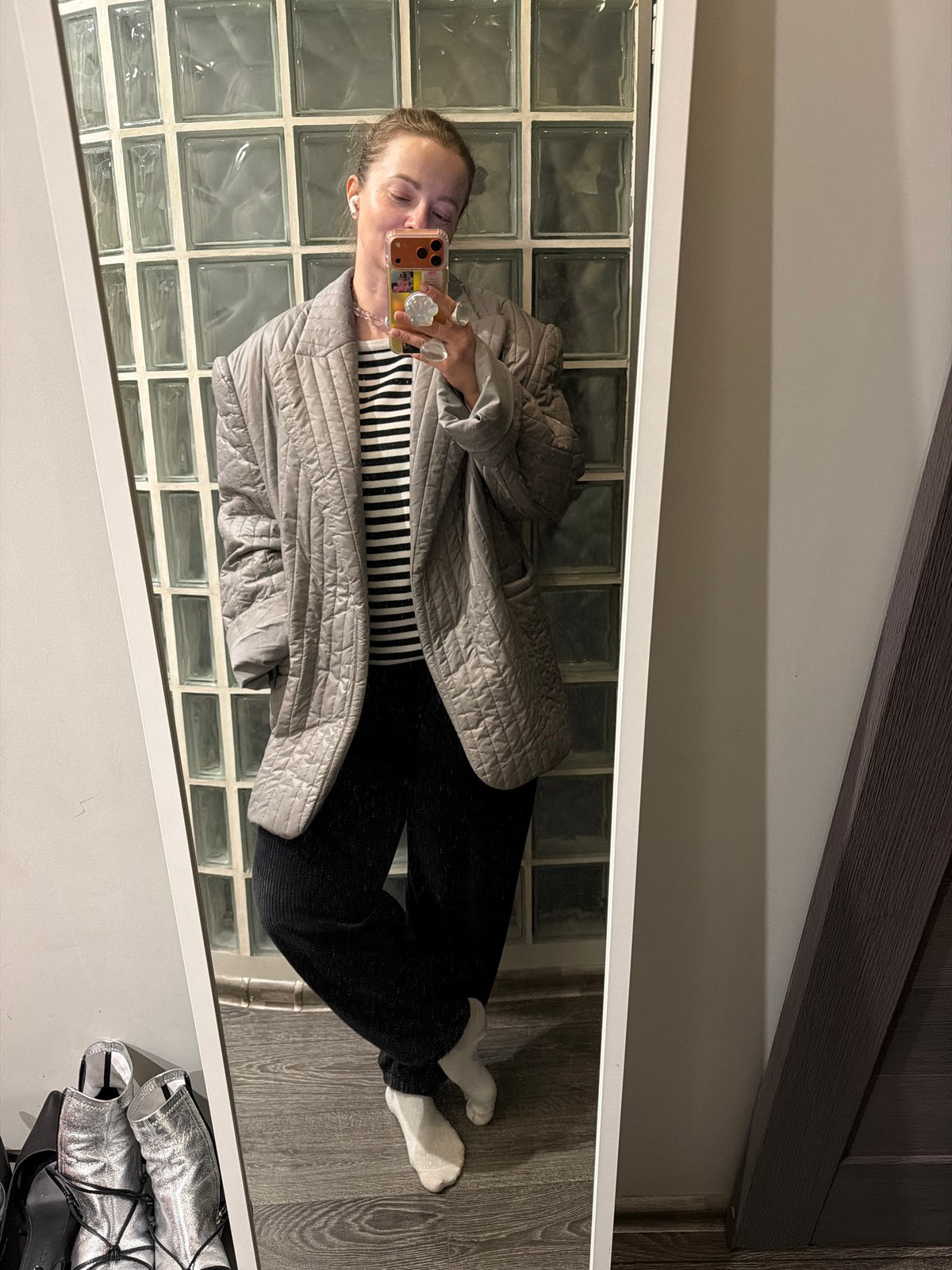 Mirror selfie captured in Moscow apartment