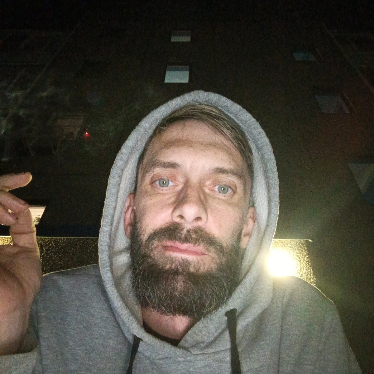 Man takes nighttime selfie in Russian town parking area