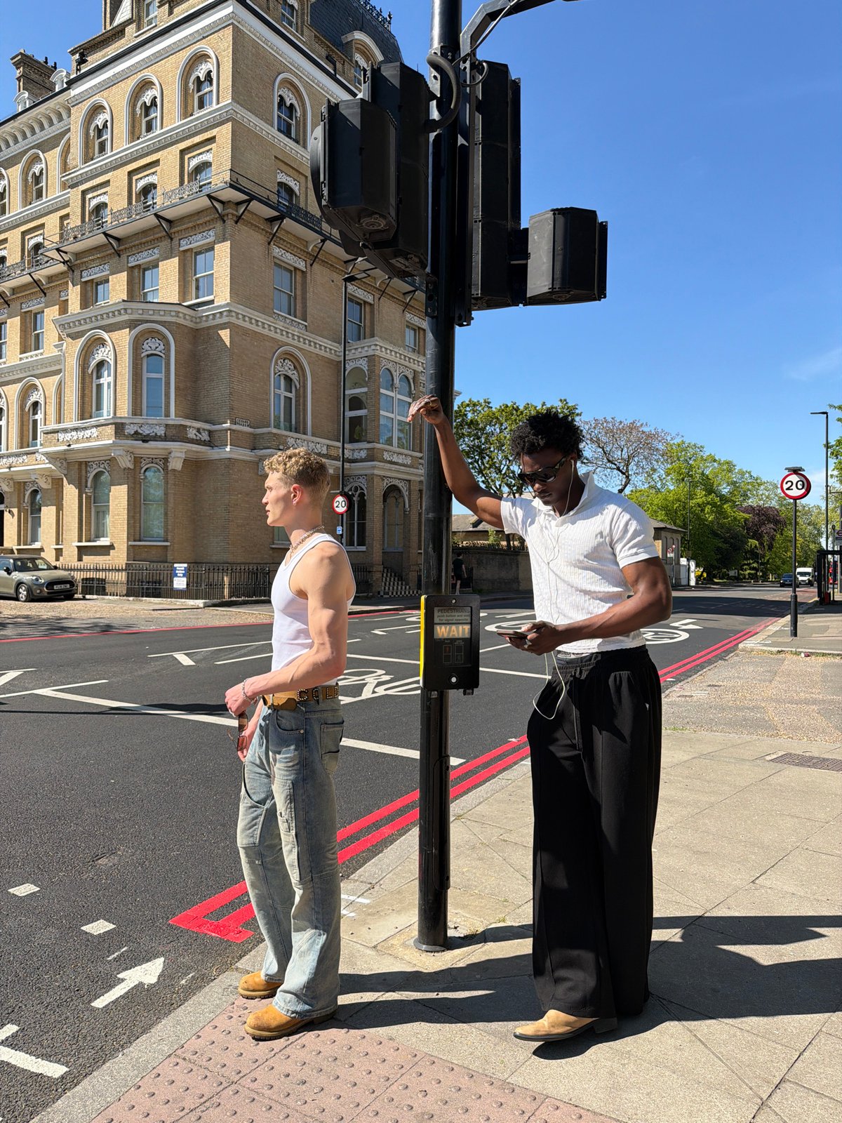 Londoners spotted using phones in parks, crossings during sunny afternoon