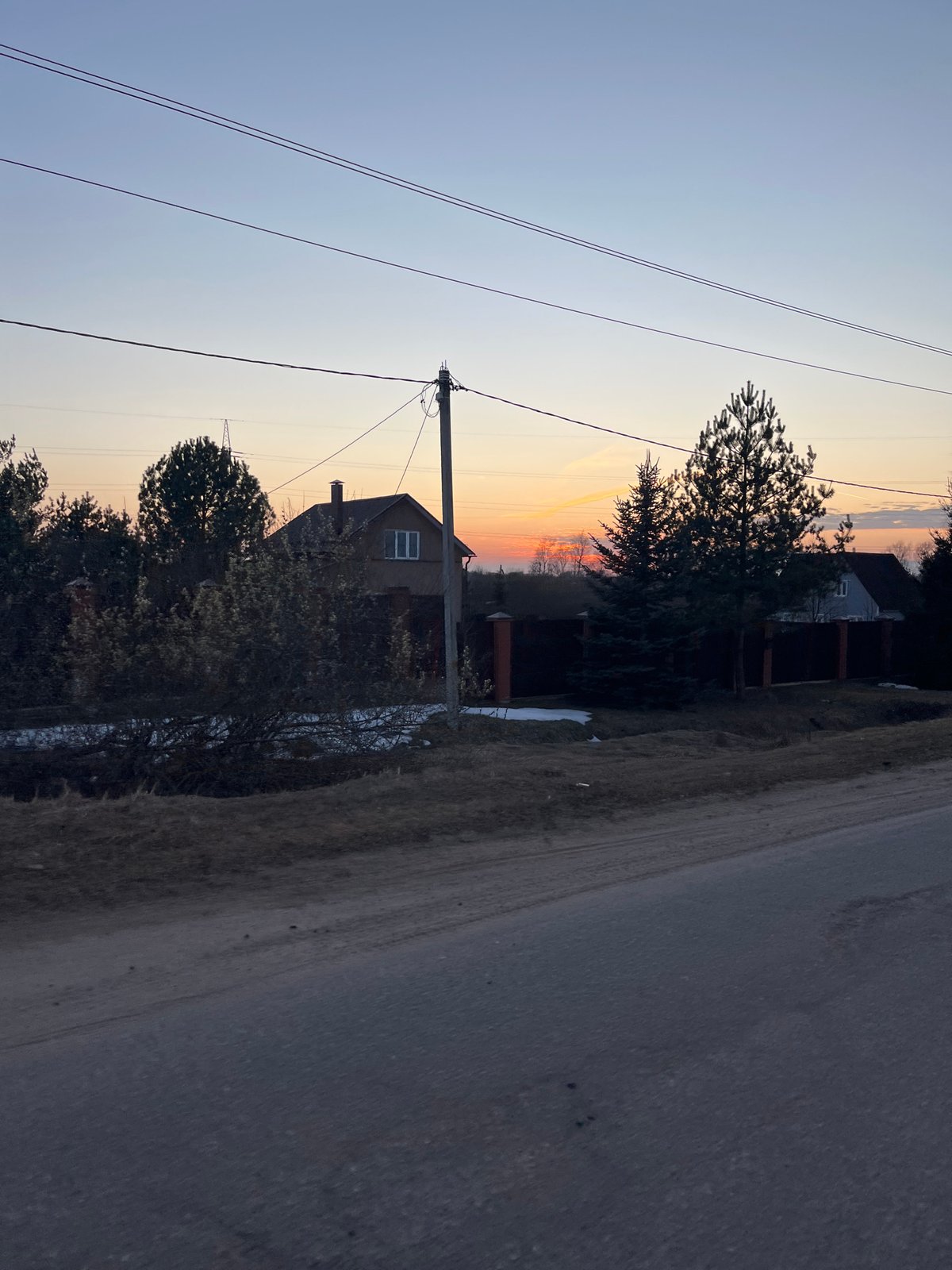 Sunset street scene captured in Раздолье, Russia