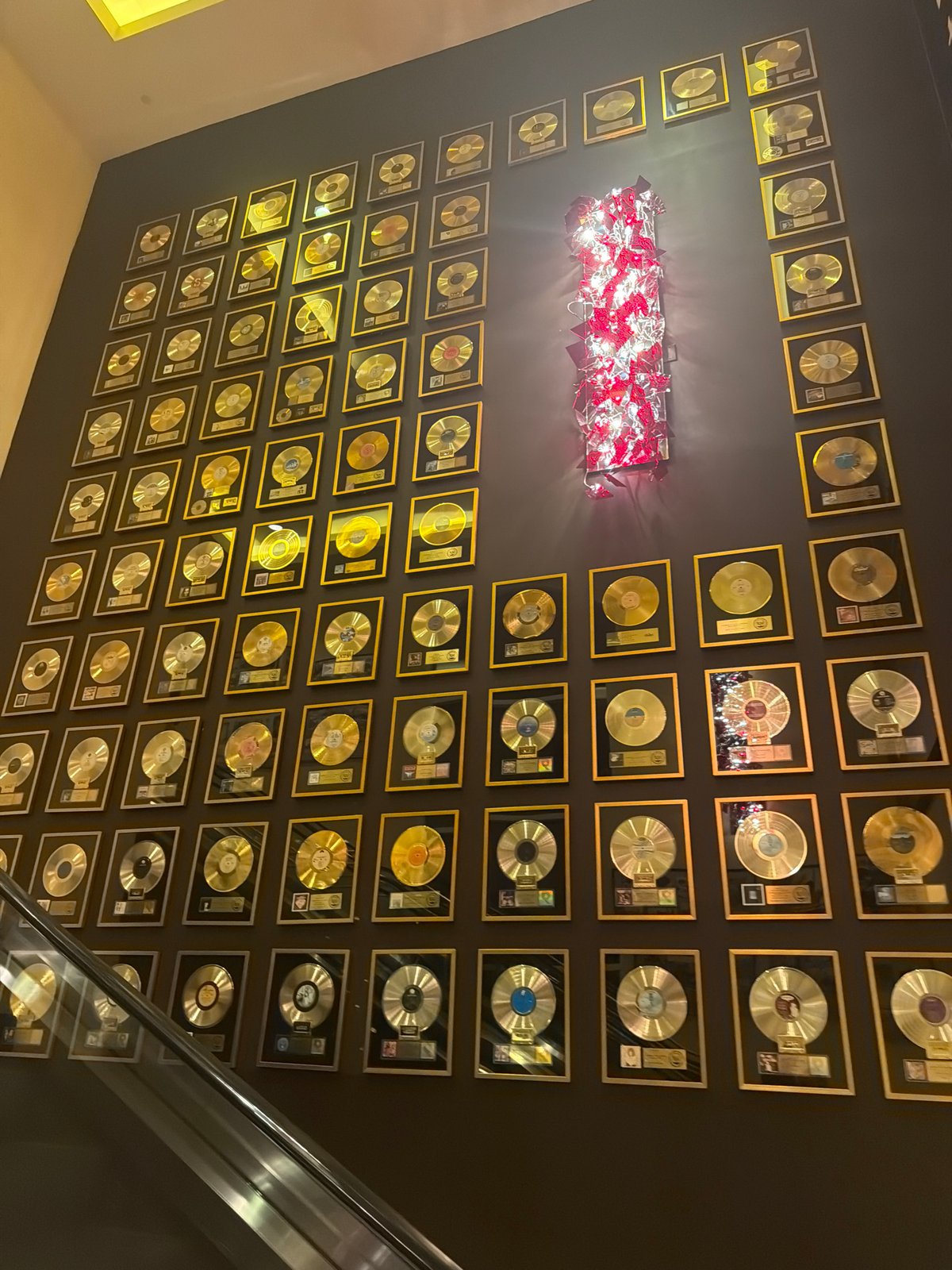 Inside Seminole Hard Rock: casino floor, waterfall atrium, and gold records