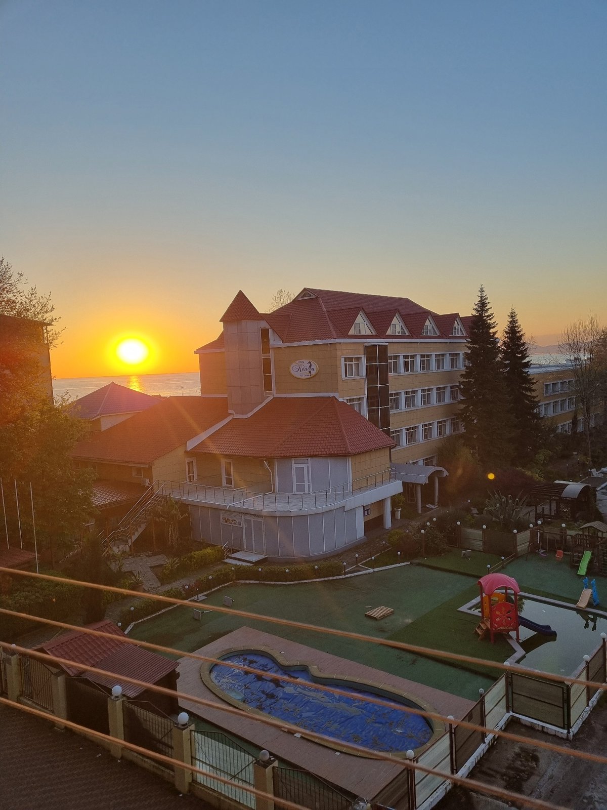 Aerial view captures Sochi coastal resort at sunset