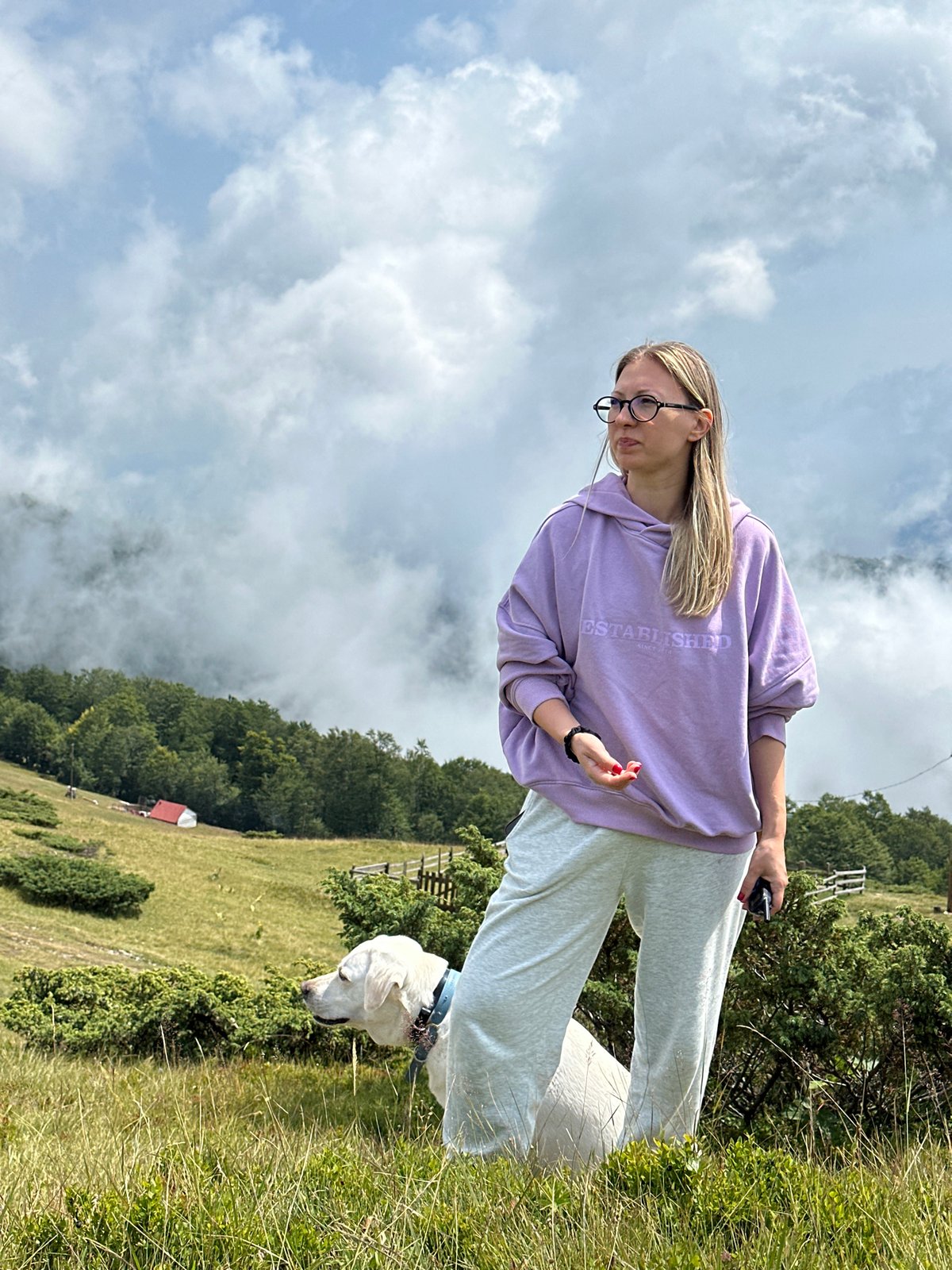 Hillside hangout with a white dog in rural Montenegro