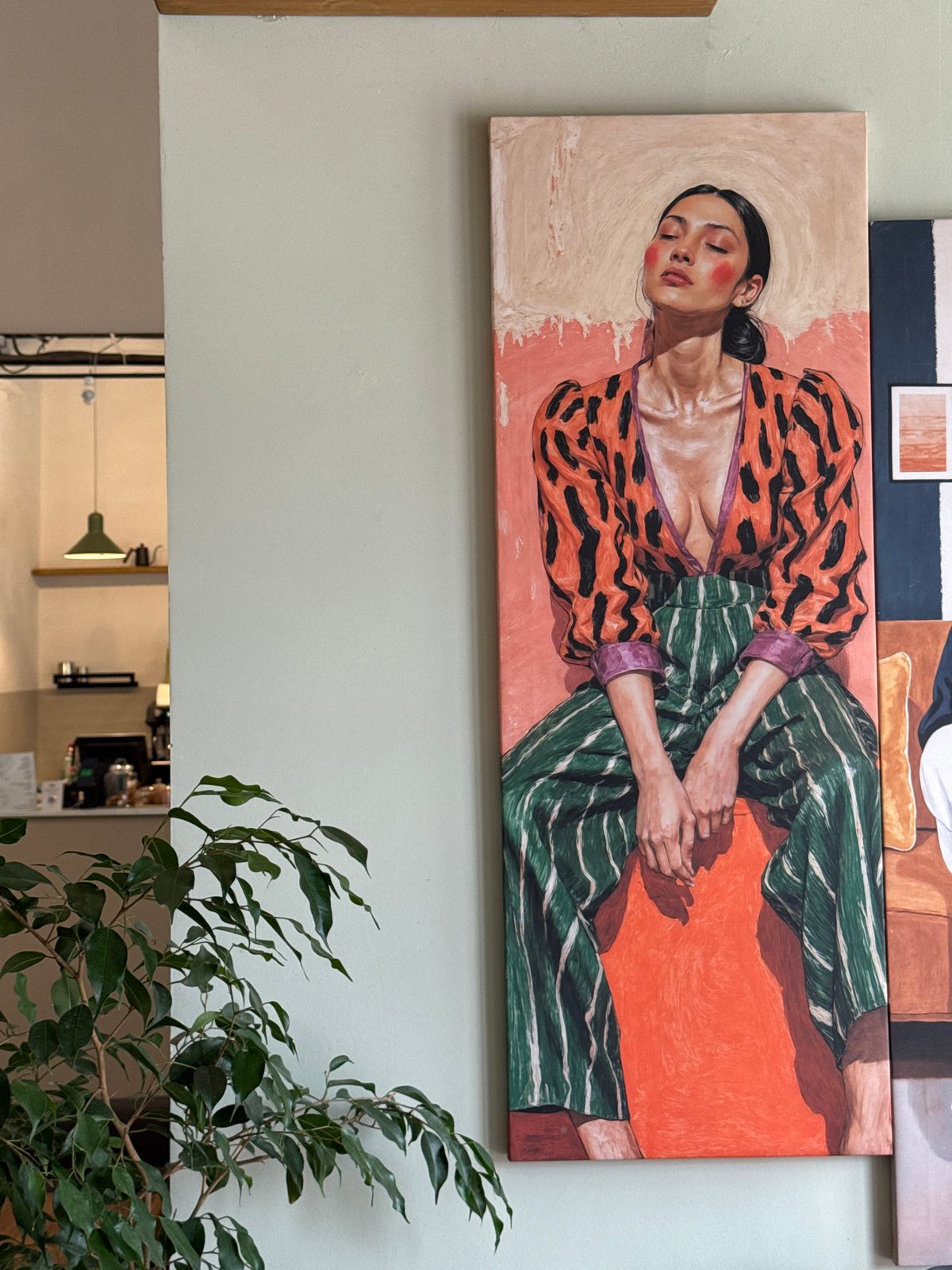 Moscow interior displays painting and bottled items observed