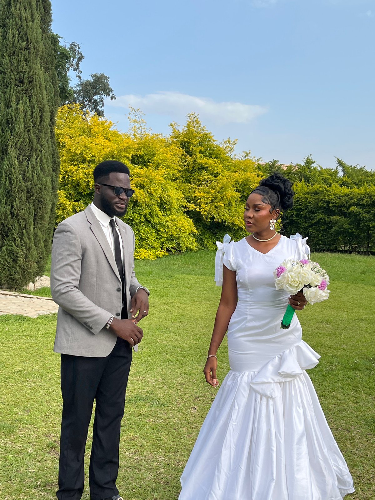 Wedding photoshoot on a sunny lawn in Bukuru, Nigeria