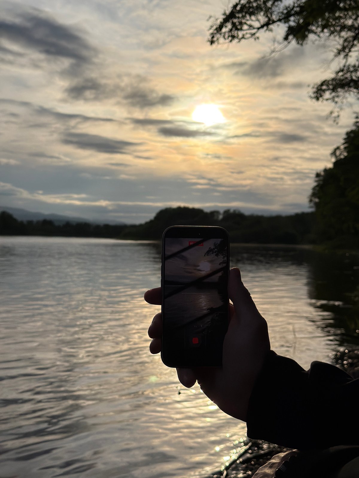 Golden hour riverside gathering documented in Birobidzhan, Russia