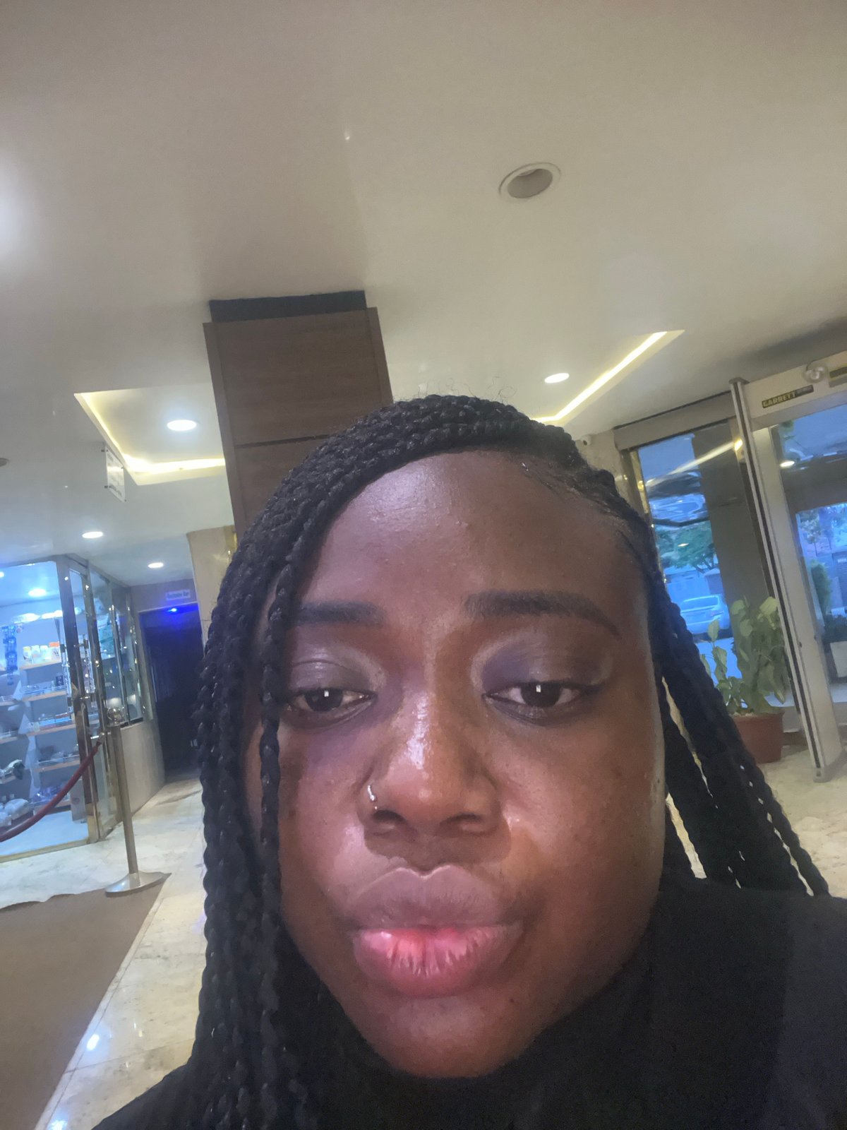 Art viewing and selfie moment captured in Abuja lounge