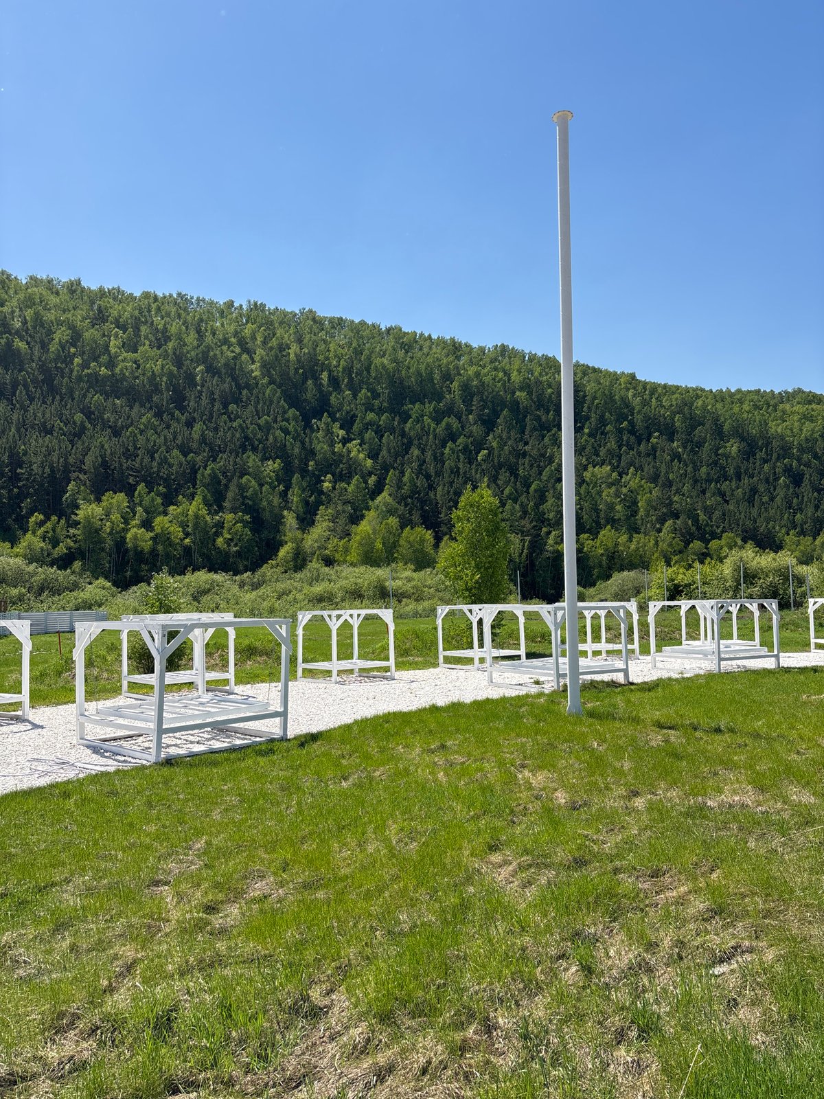 Artist sketches outdoors at Russian leisure facility during morning
