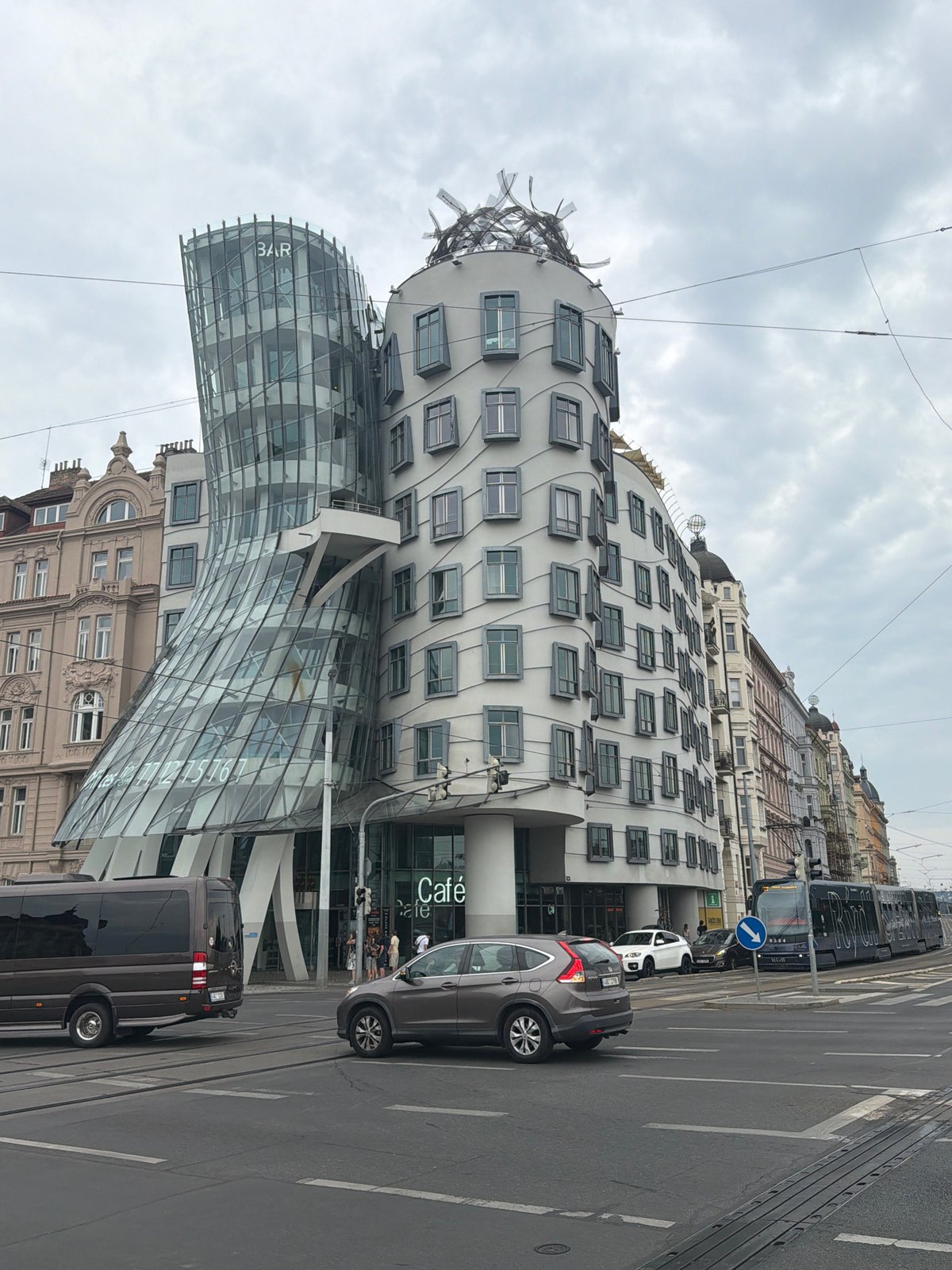 Dancing House and a nearby archway entrance, Prague