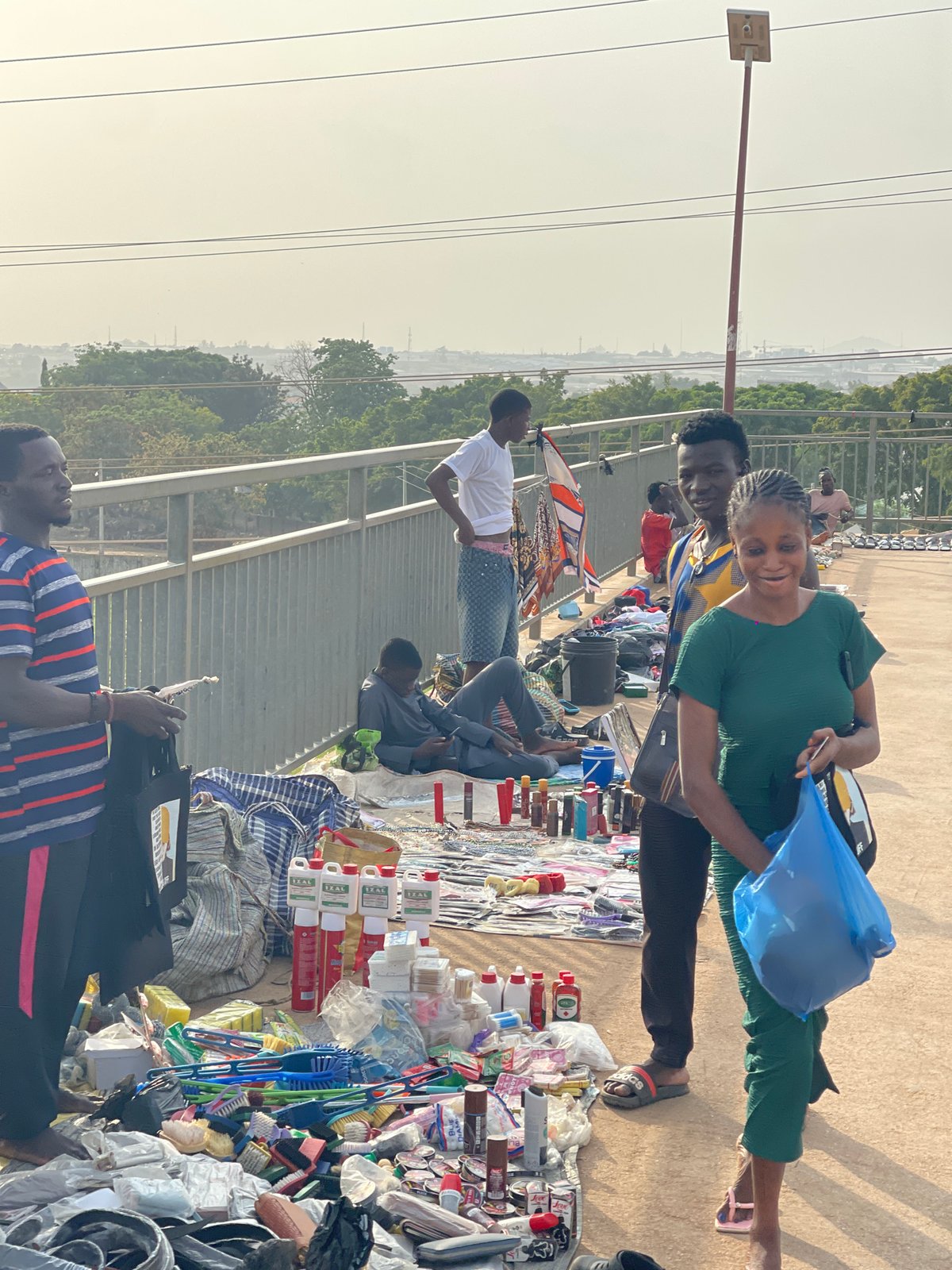 Pedestrian bridge becomes makeshift marketplace in Kuchingoro, Nigeria