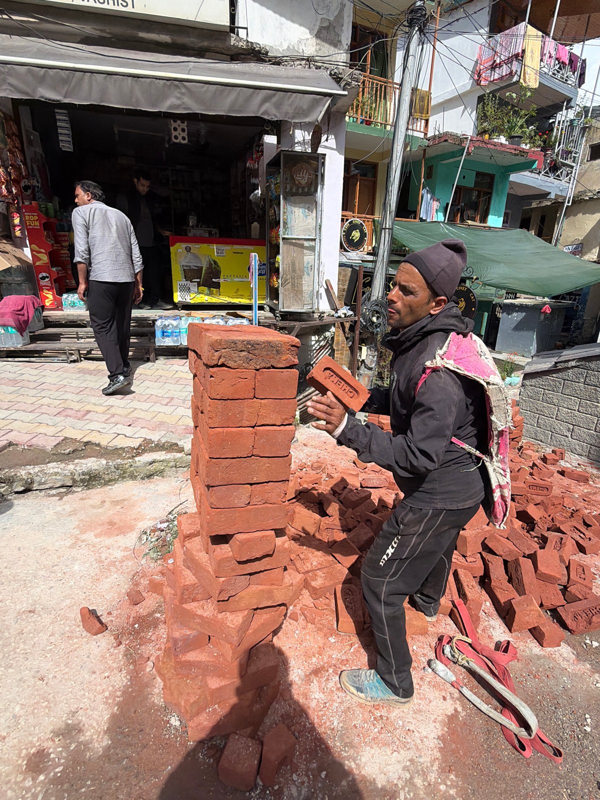 Morning street life in Vashisht's alleys, courtyards, and cafes