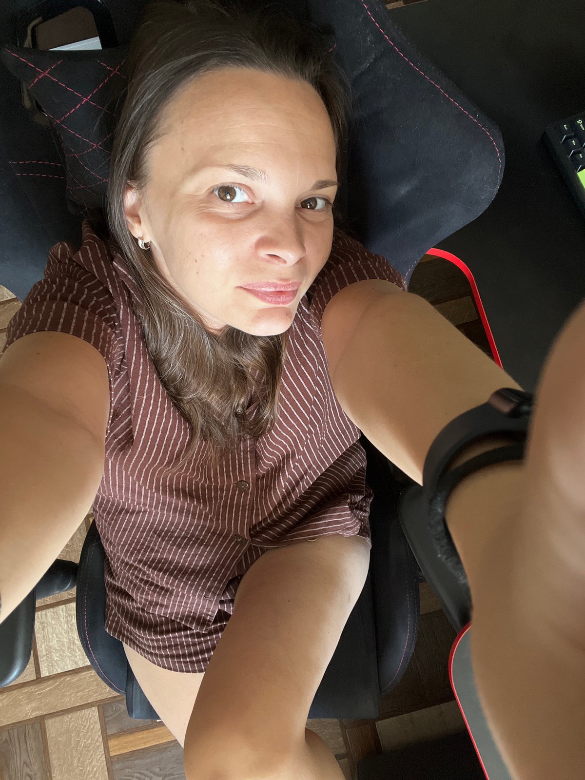 Casual selfie session at a gaming desk in Tolyatti