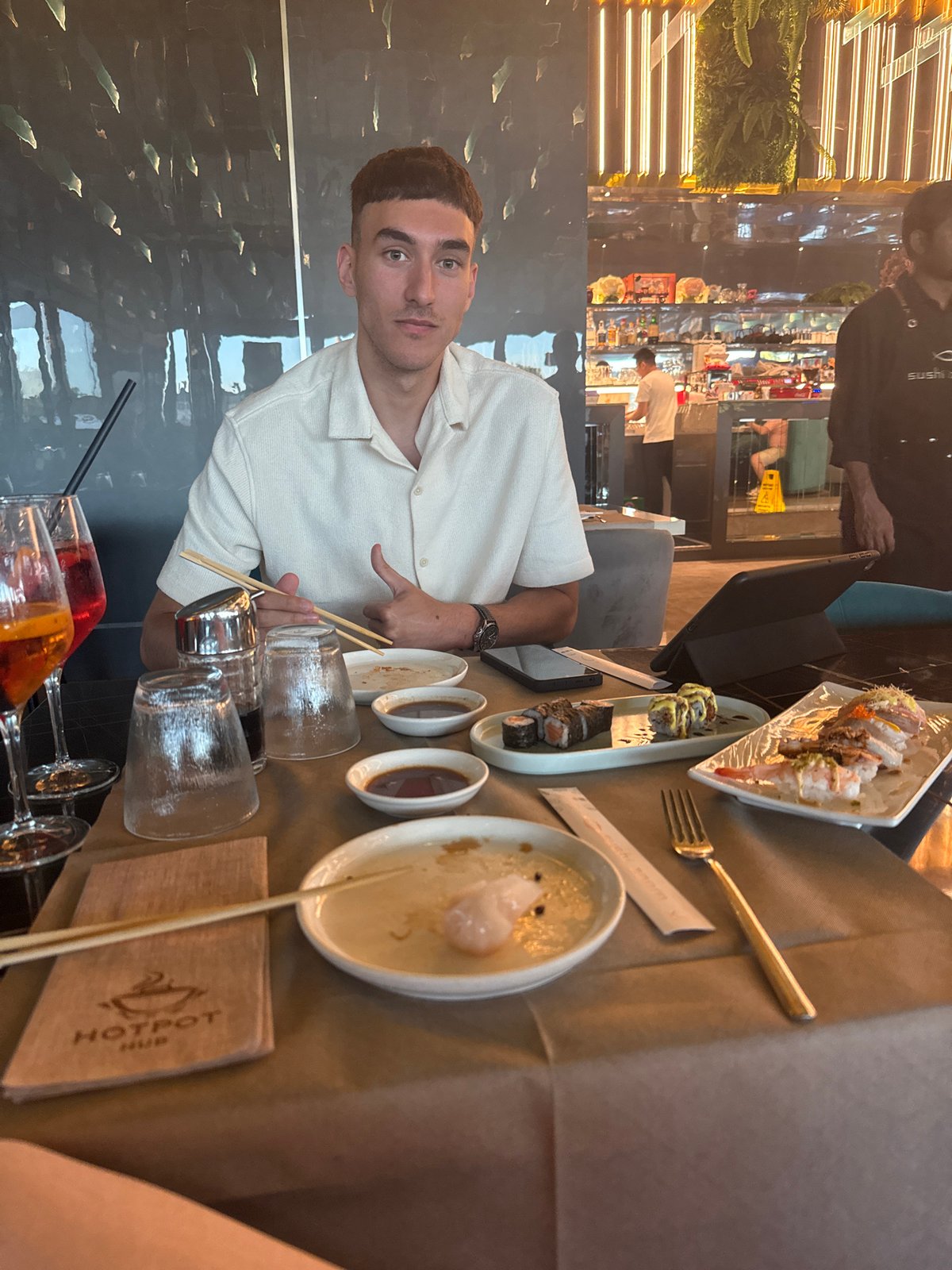 Evening dining and leisure activities captured across multiple indoor venues