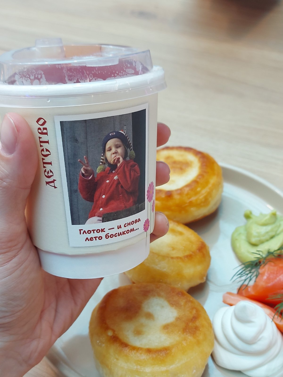 Takeout meal with labeled container photographed in Saint Petersburg