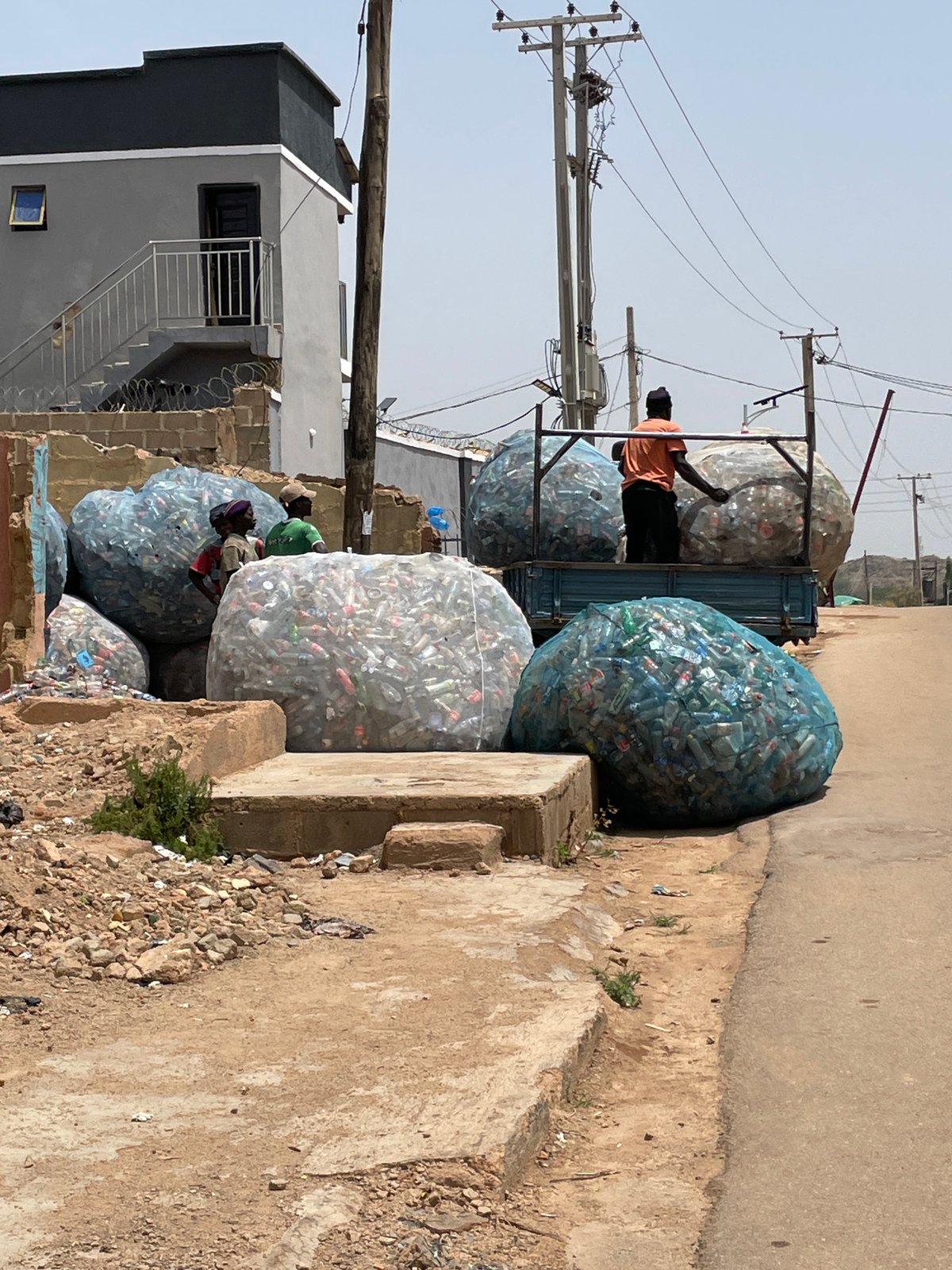 Daily life documented across Jos, Nigeria streets and commercial areas