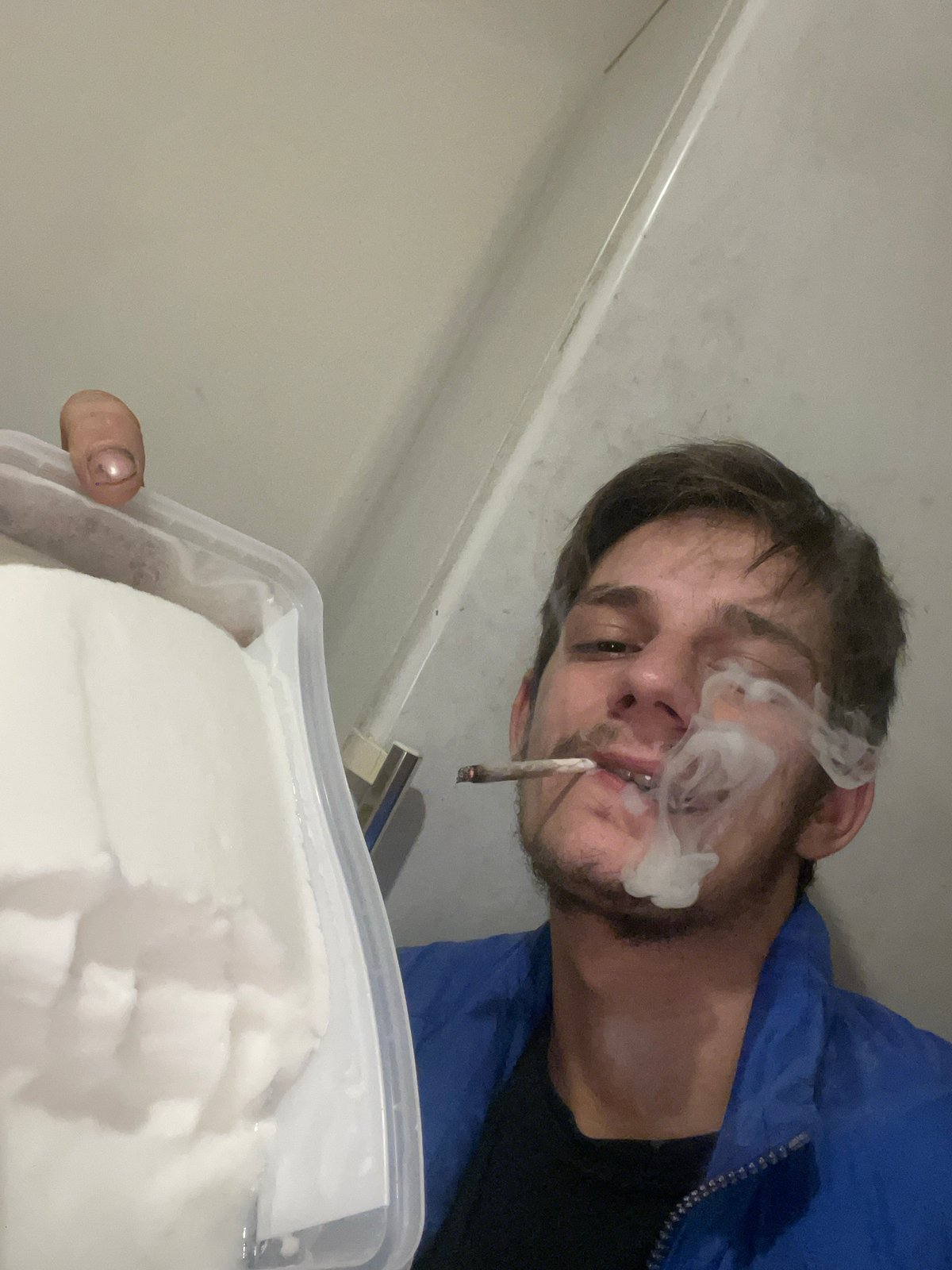 Man documented smoking marijuana, handling substances at unknown location