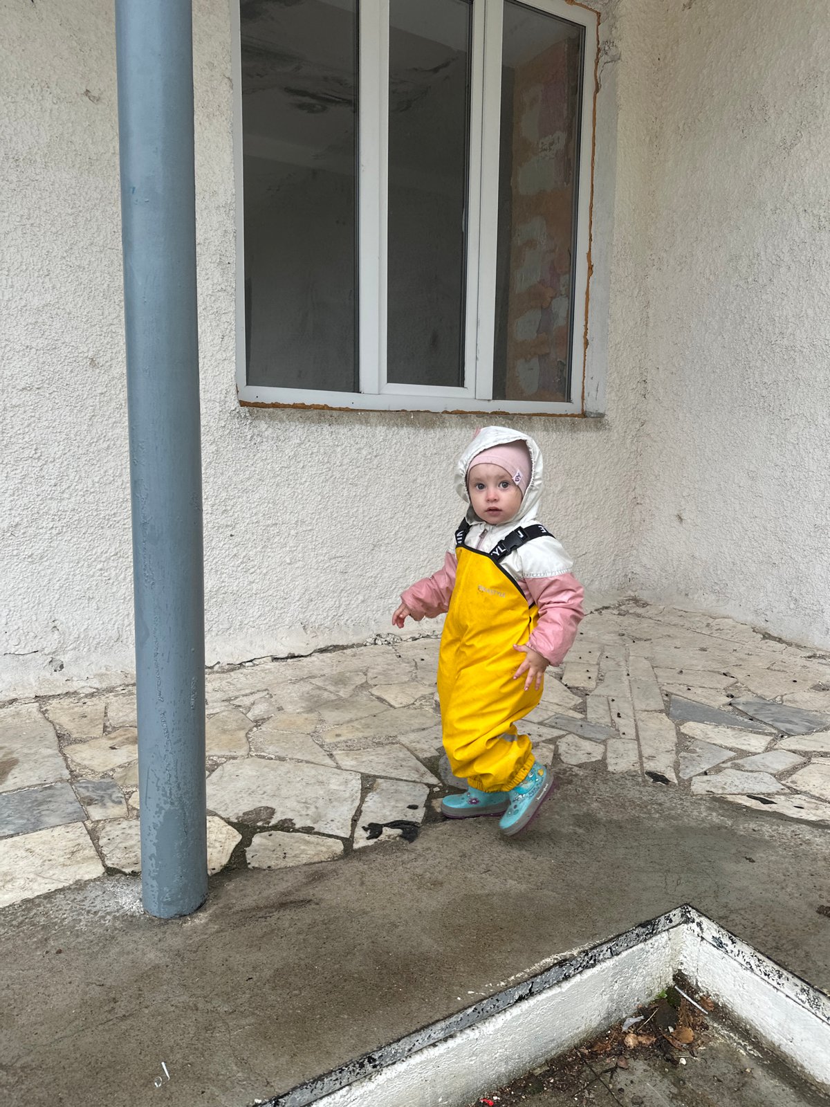 Rainy day outing with a toddler in Yaroslavka, Russia