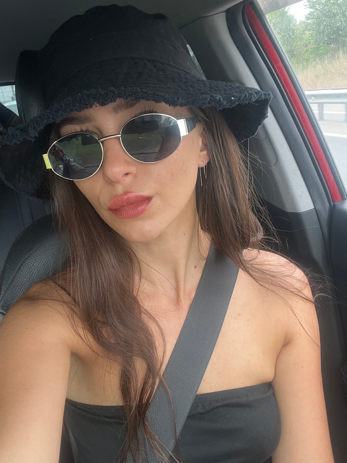 Woman photographs selfies in car across Russian border towns