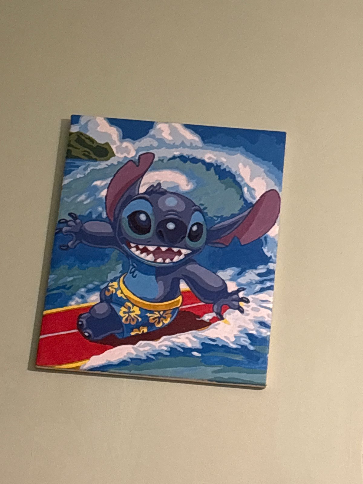 Person resting indoors with Disney decor captured in Russia