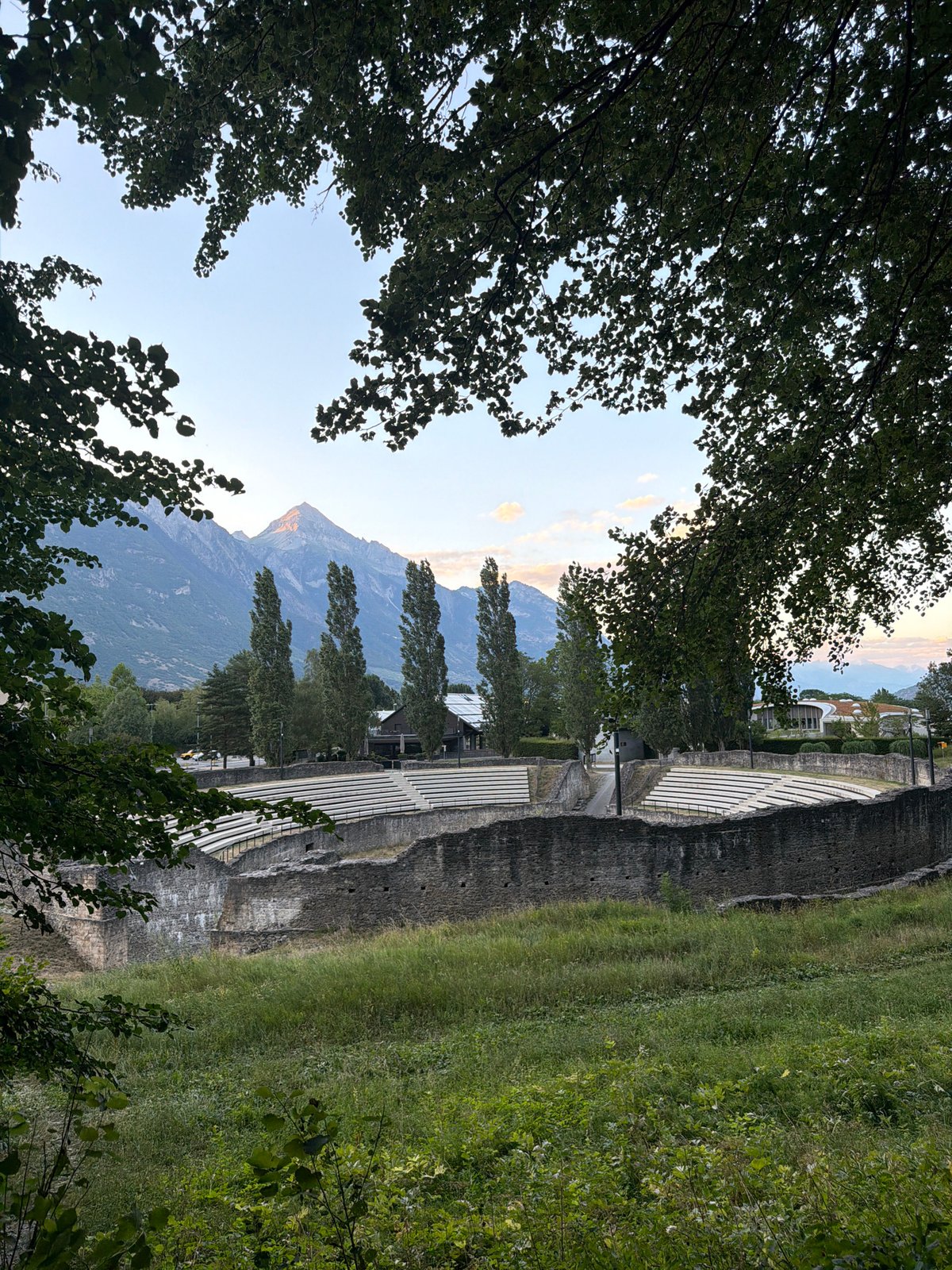 Martigny landmarks: Roman amphitheater, Alpine road, and train station