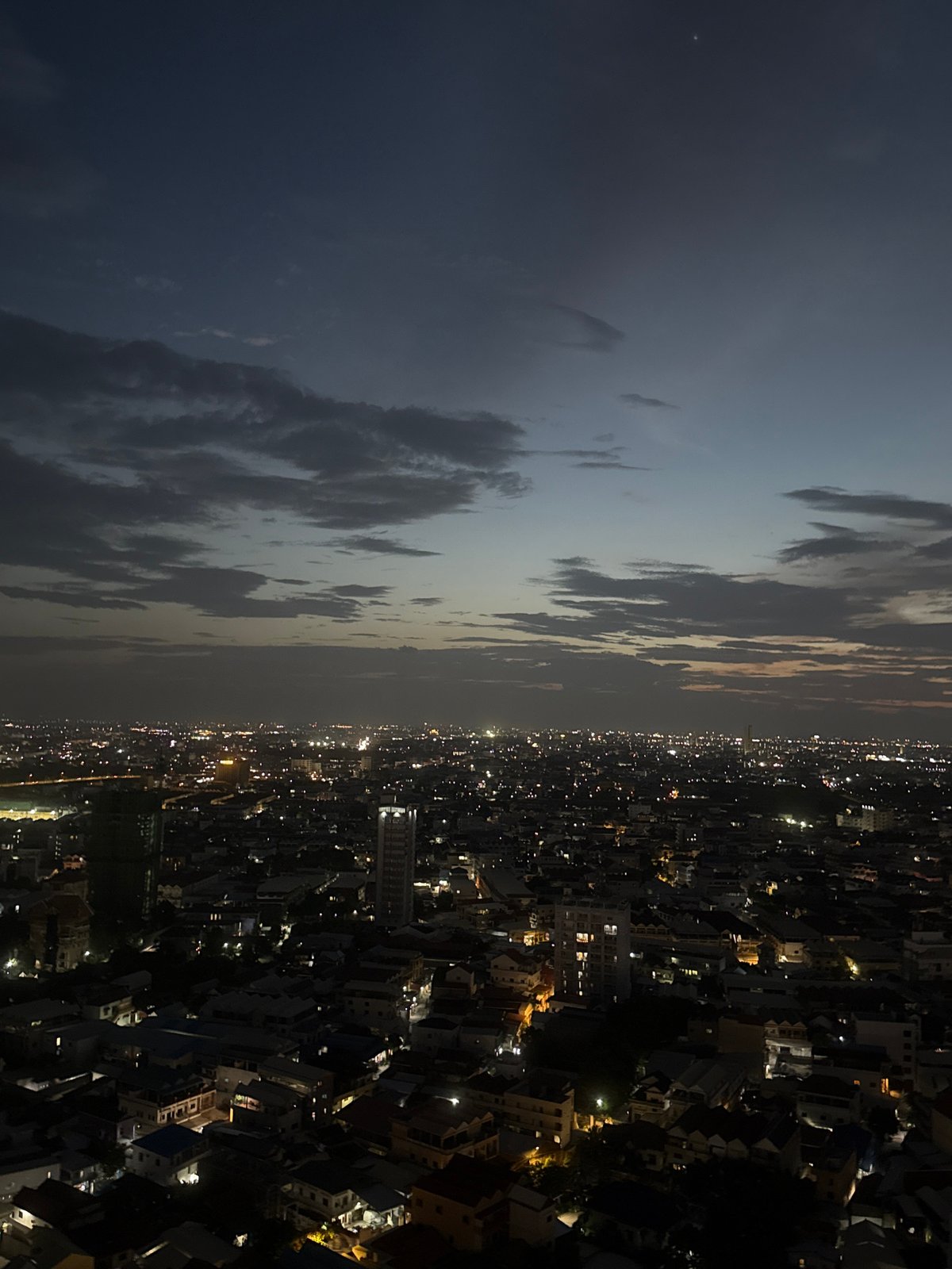 Buddha paintings and Phnom Penh nightscapes from Khan Mean Chey