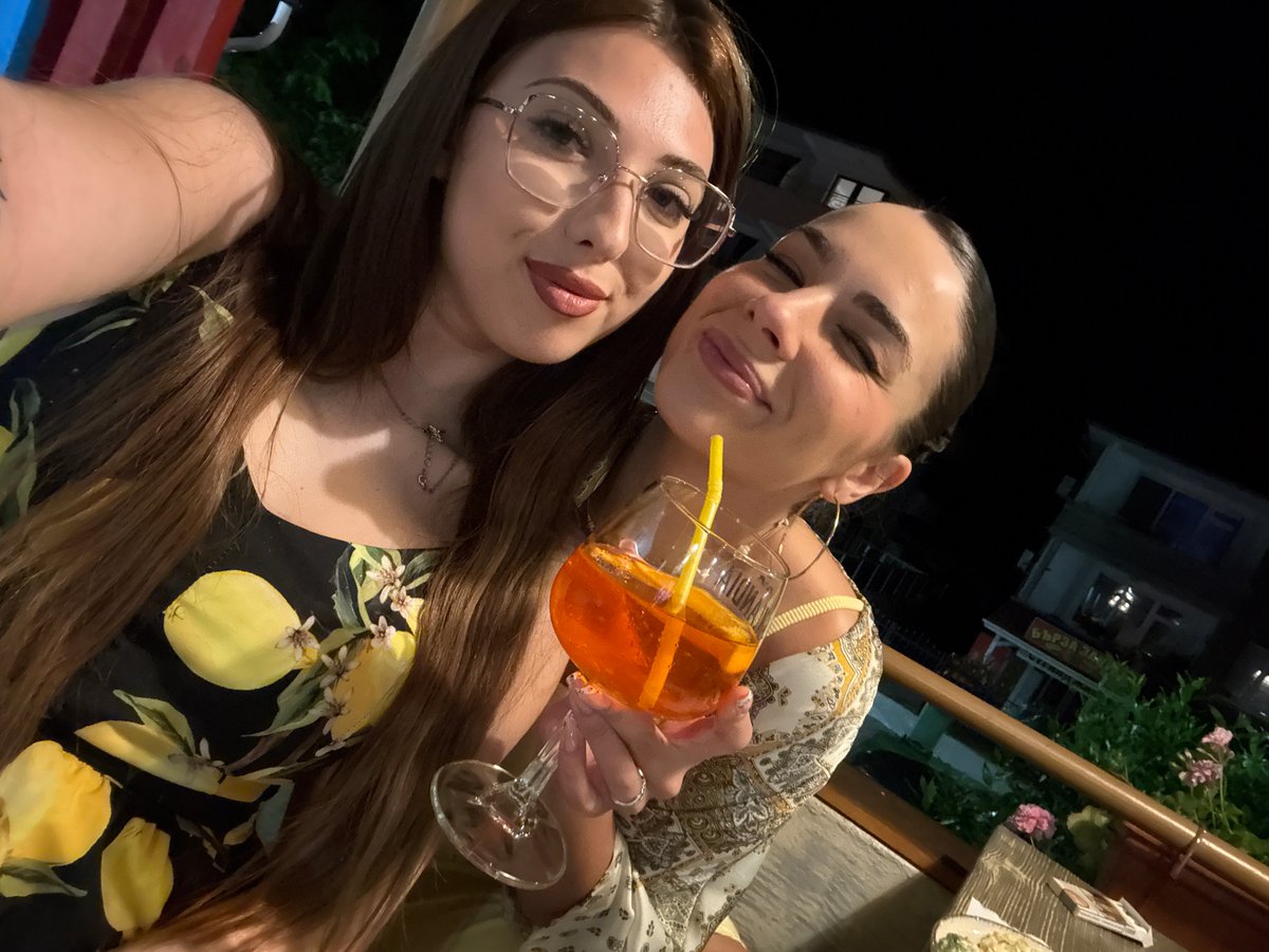 Two women enjoy dinner and drinks at Ravda restaurant
