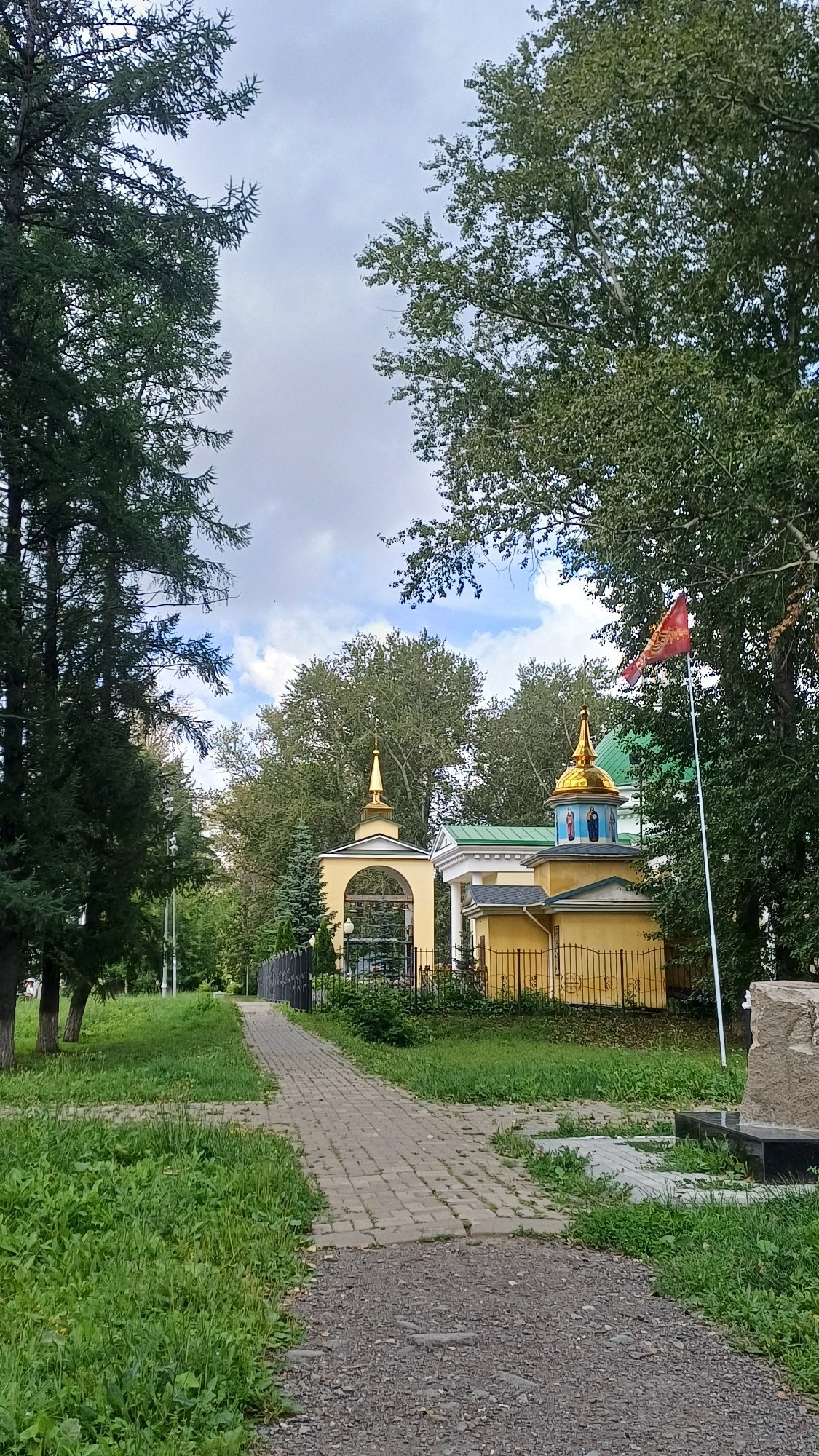 Summer morning in an Izhevsk park near a landmark church