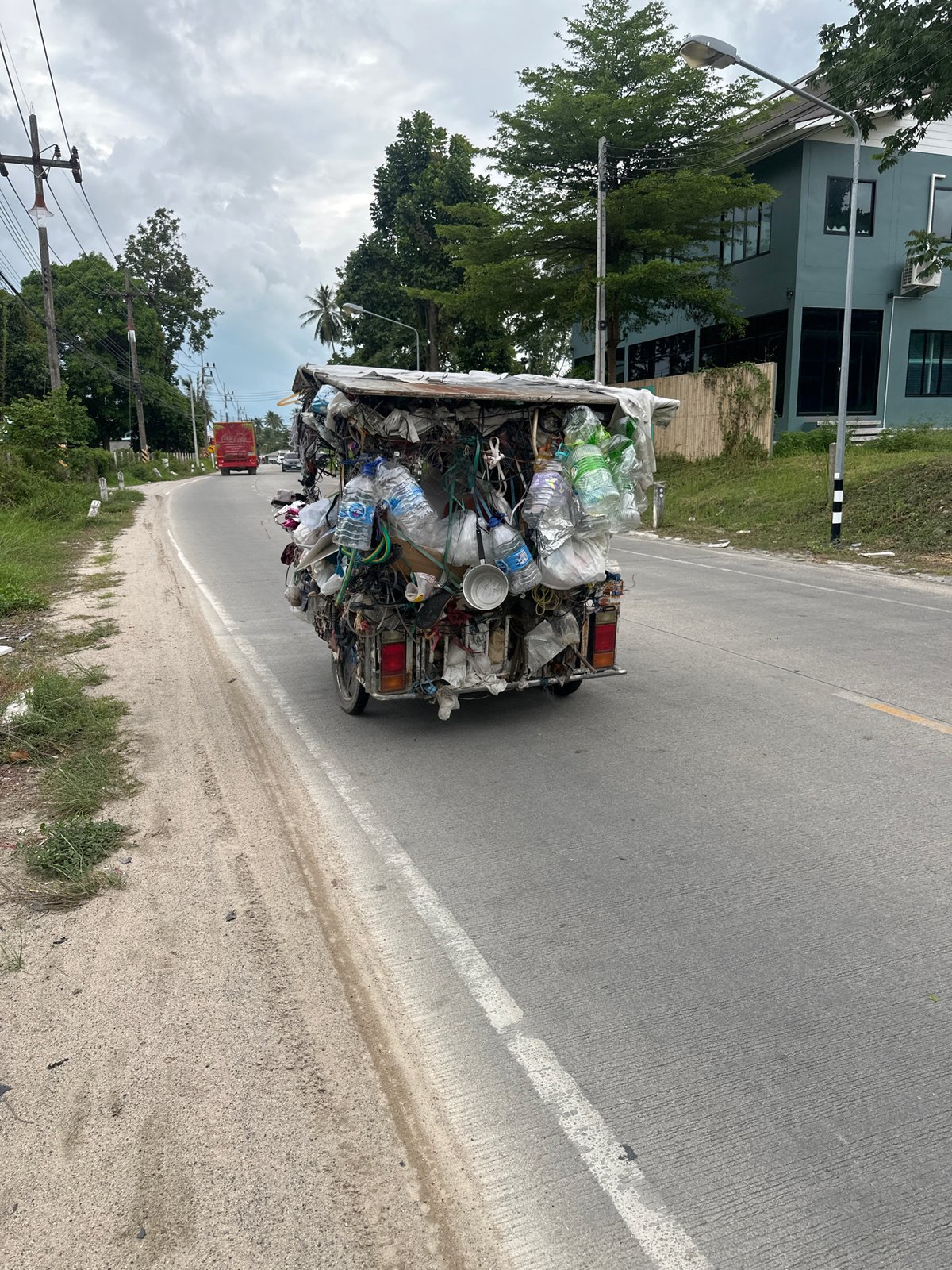 Overloaded three-wheeler spotted on Koh Phangan road