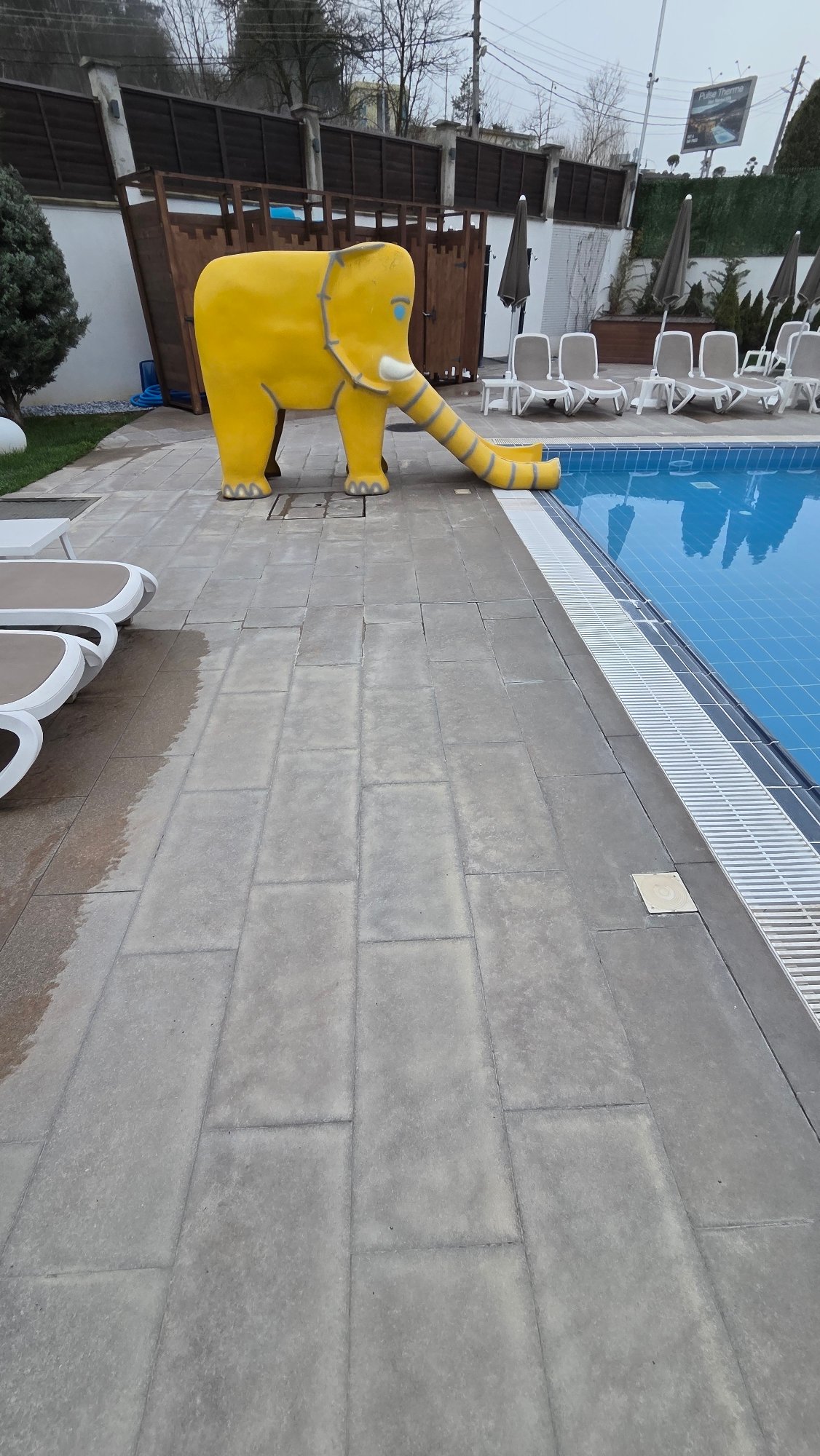 Yellow elephant slide spotted at Bania pool facility