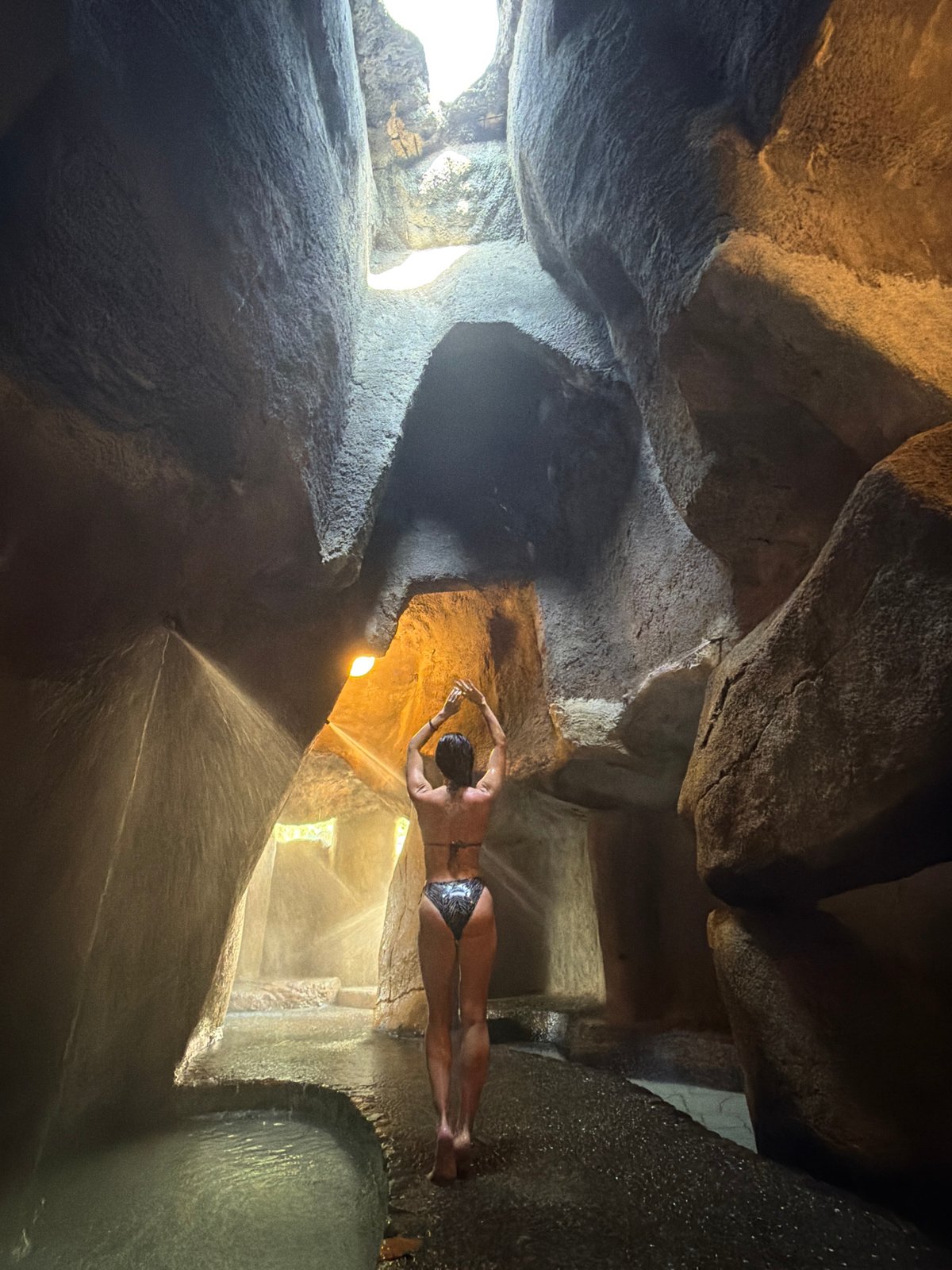 Tourist explores natural grotto in Nha Trang, Vietnam