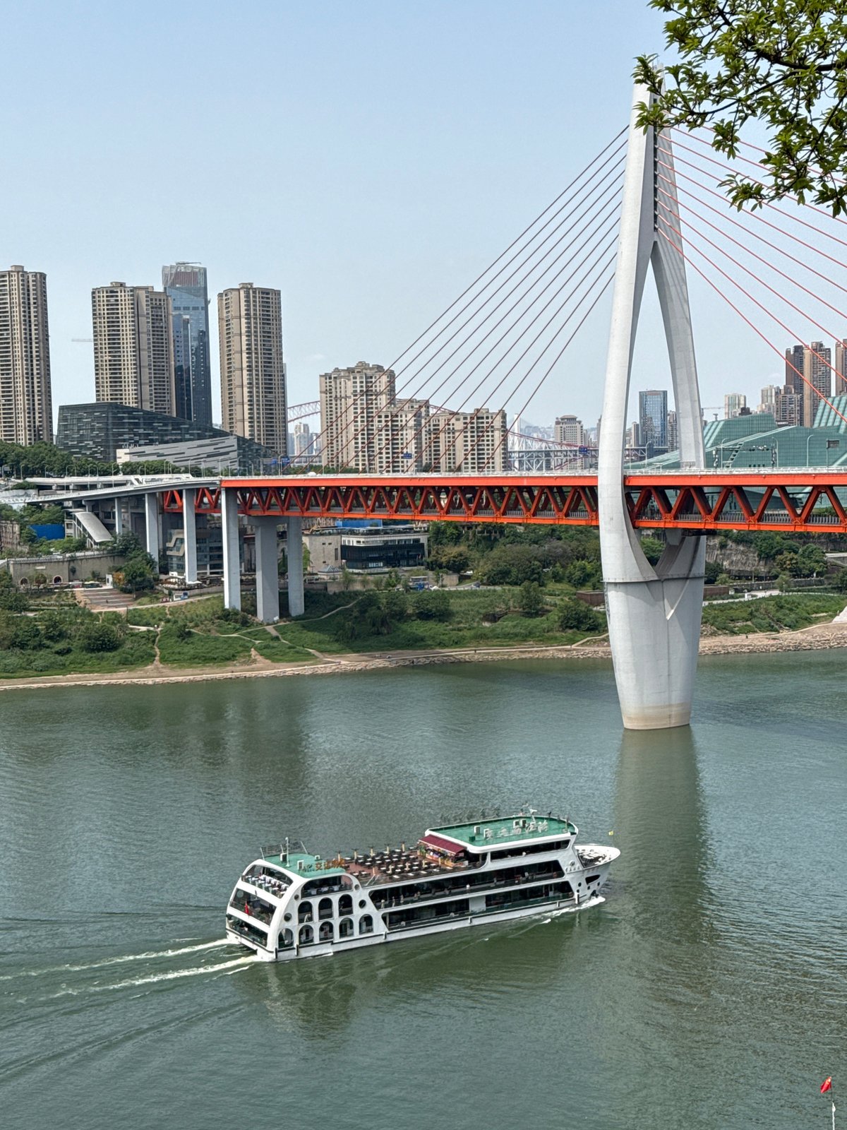 Passenger boat navigates river in Yuzhong District, China