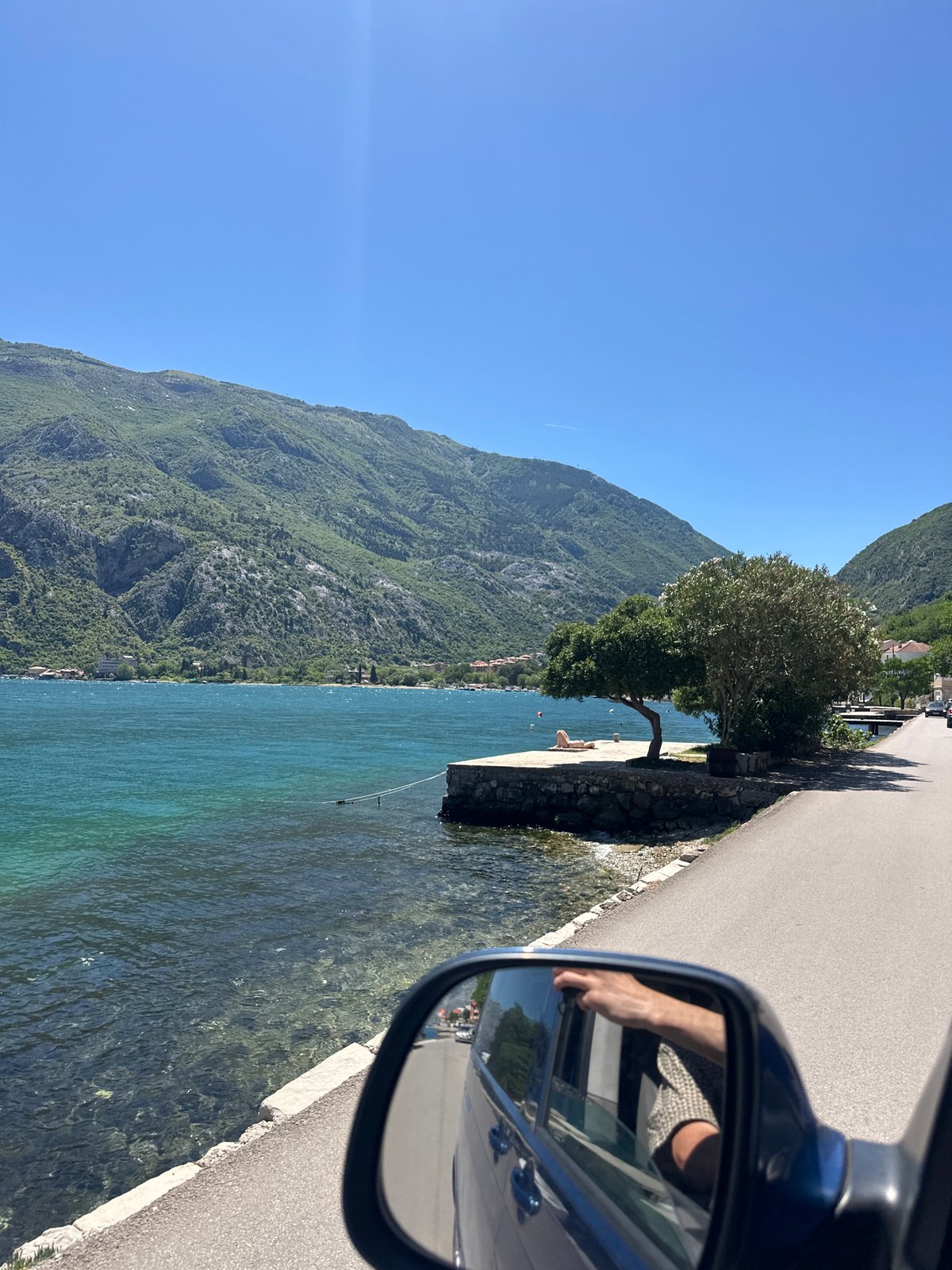 Scenic Bay of Kotor views captured from vehicle in Montenegro
