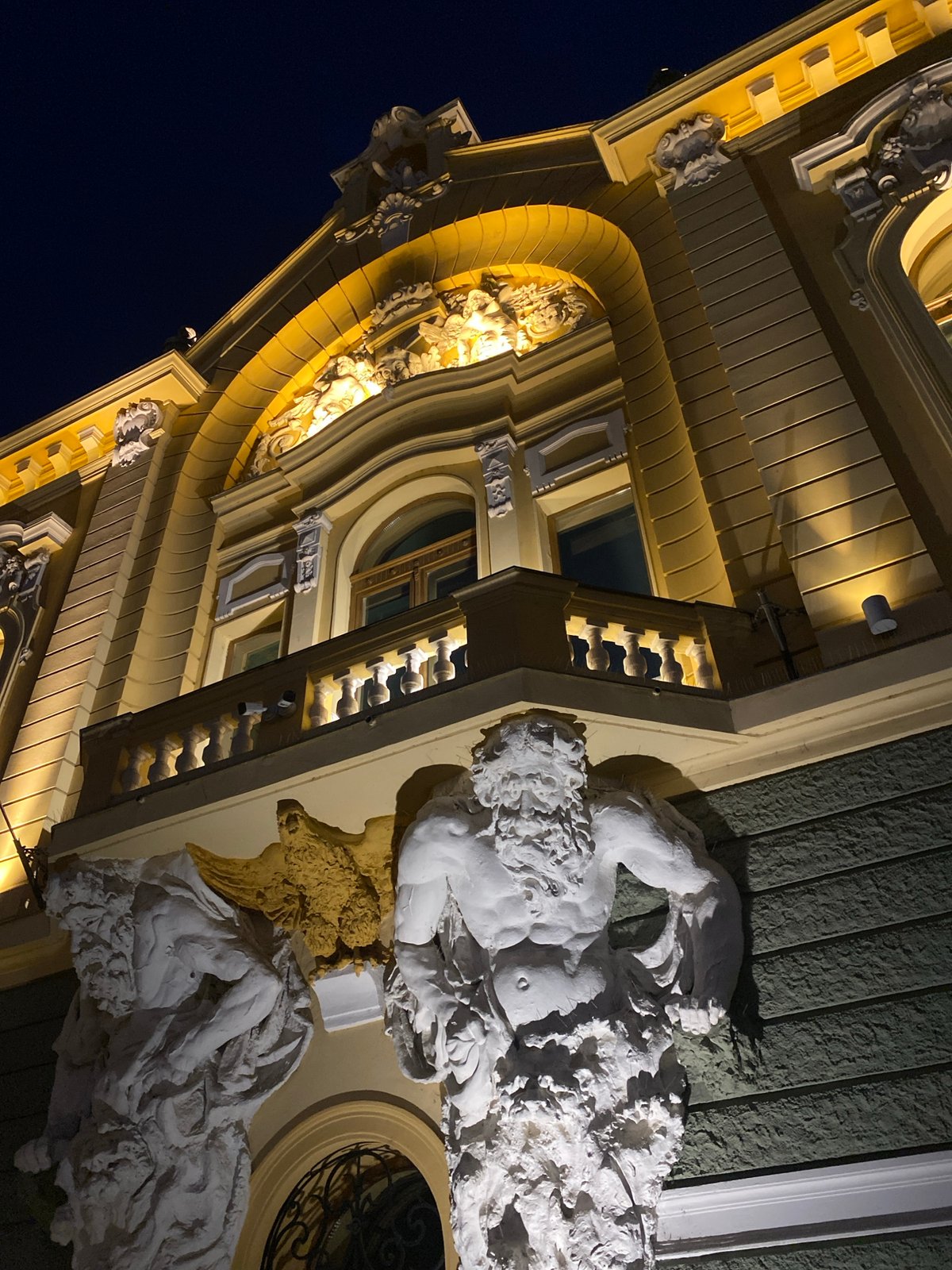 Nighttime photography captures illuminated Art Nouveau buildings in Subotica