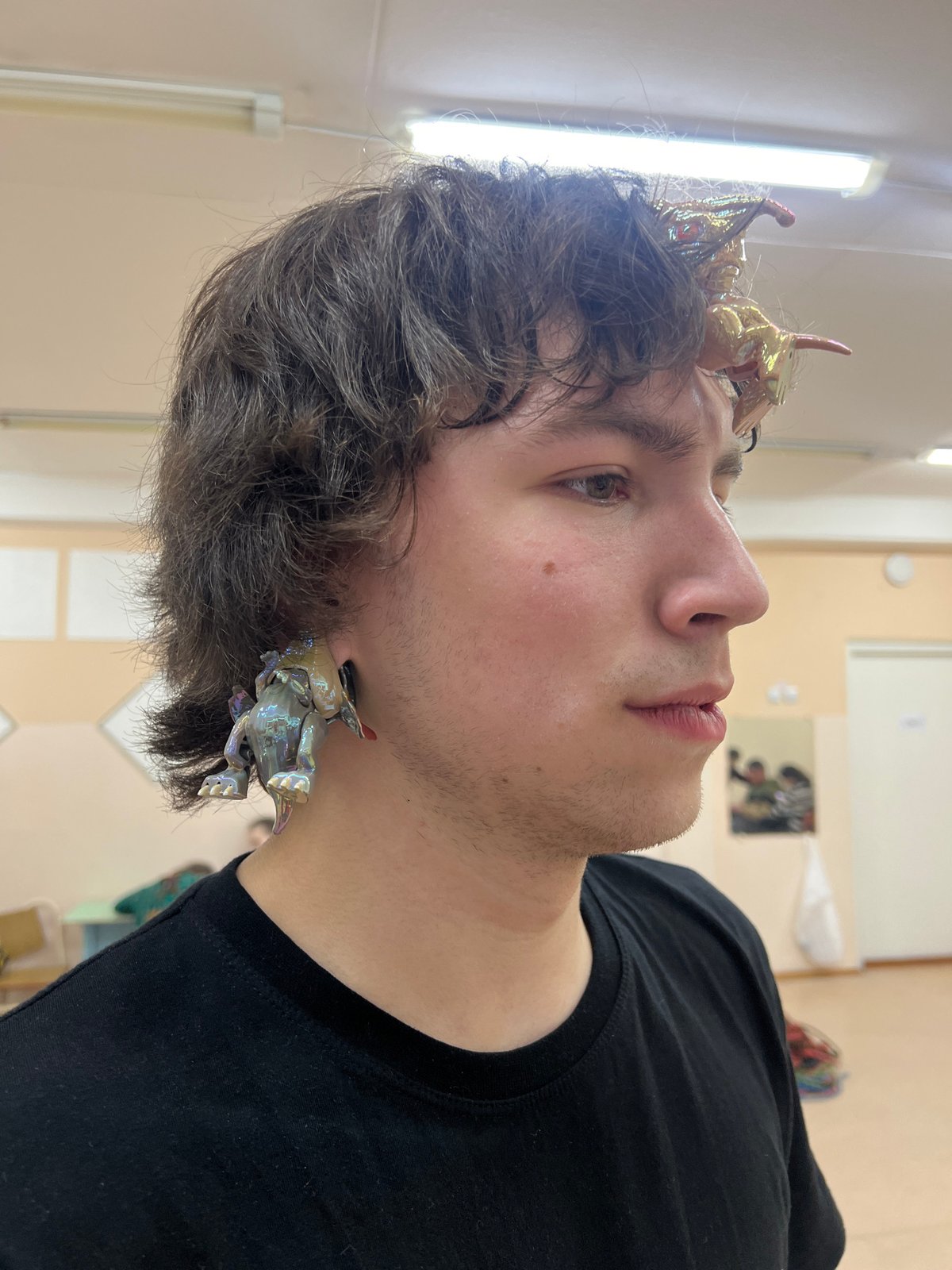 Indoor climbing session with decorative dragon accessories in Berezniki