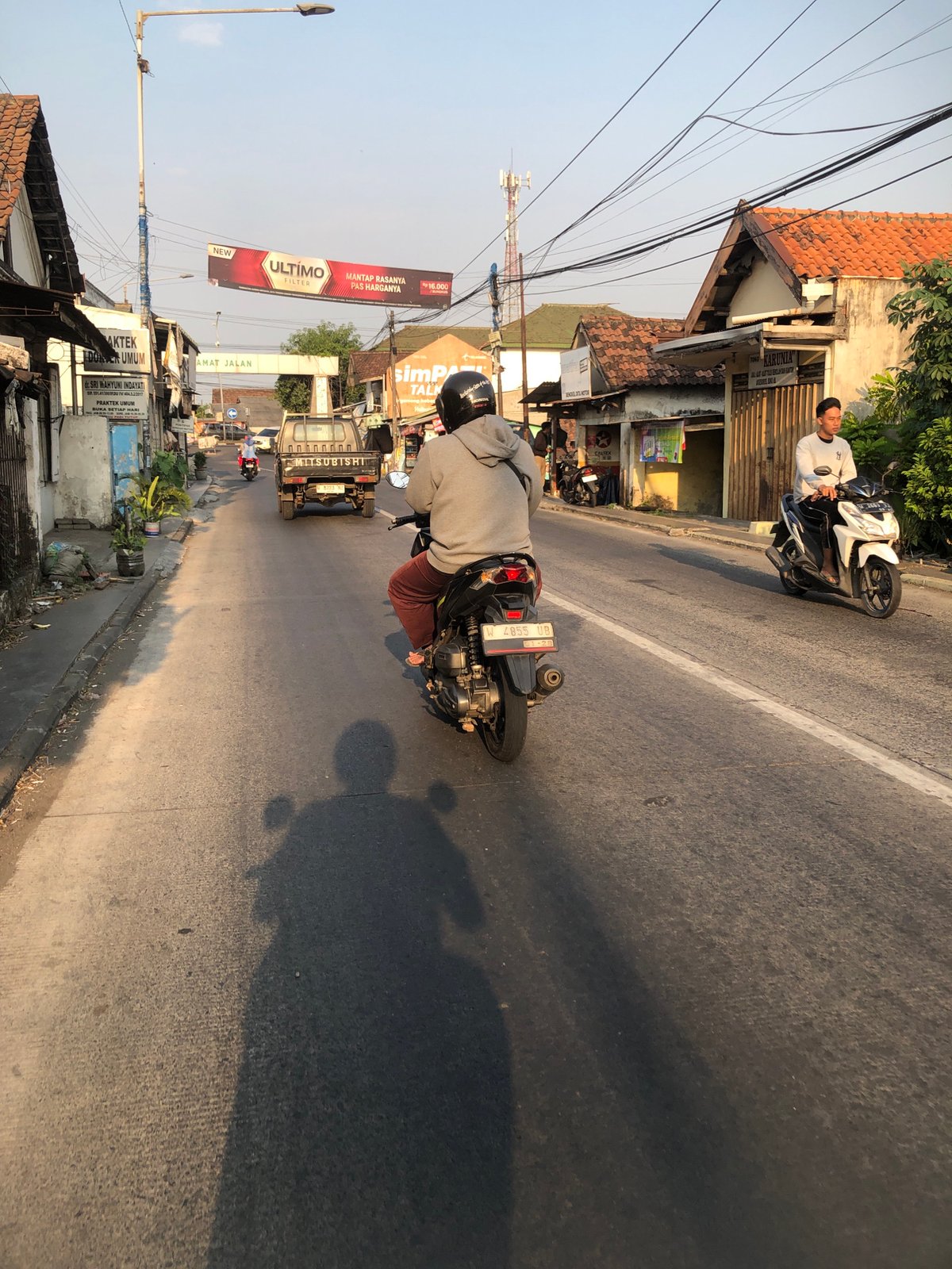 Busy morning traffic flows through Kludan and Boro, East Java