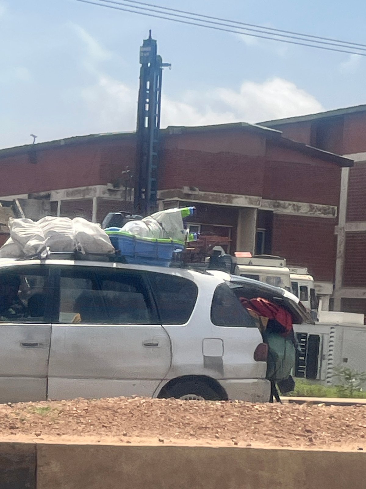 Street-level snapshots from Jos, Nigeria, mid-journey