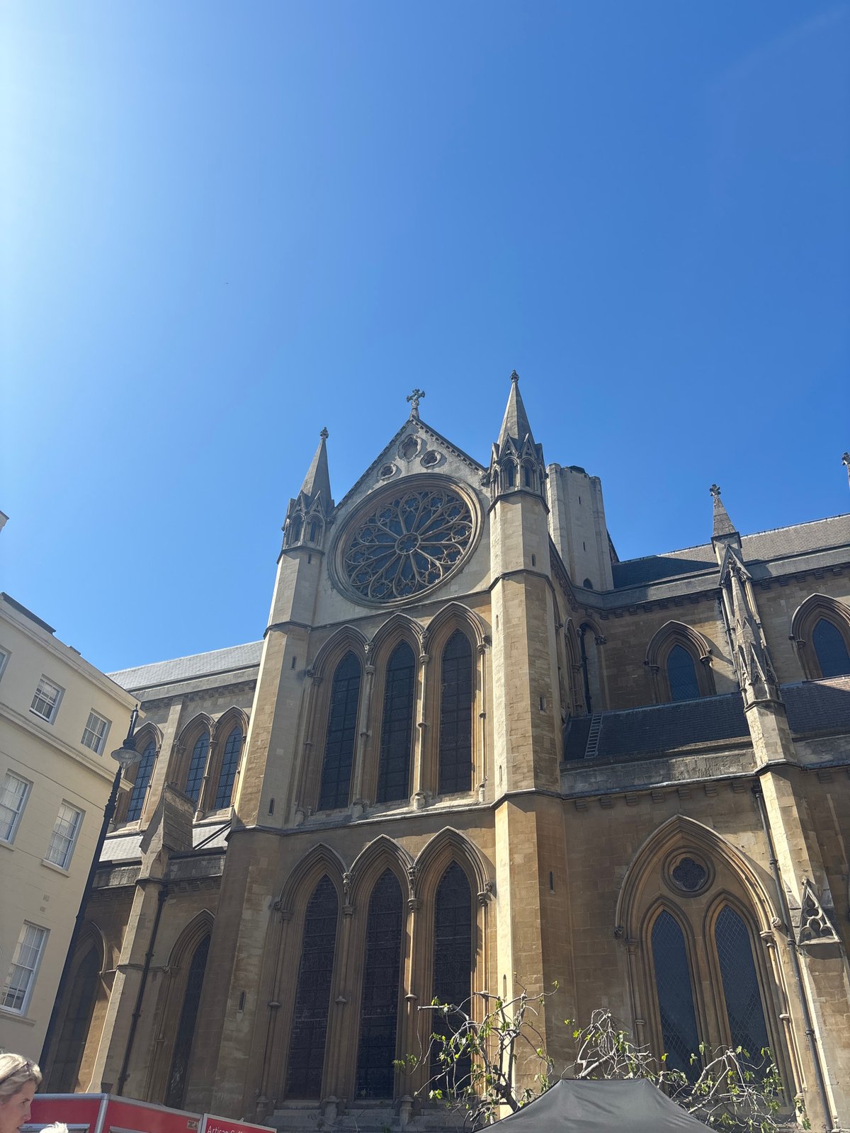 London Gothic architecture and street market captured under clear skies