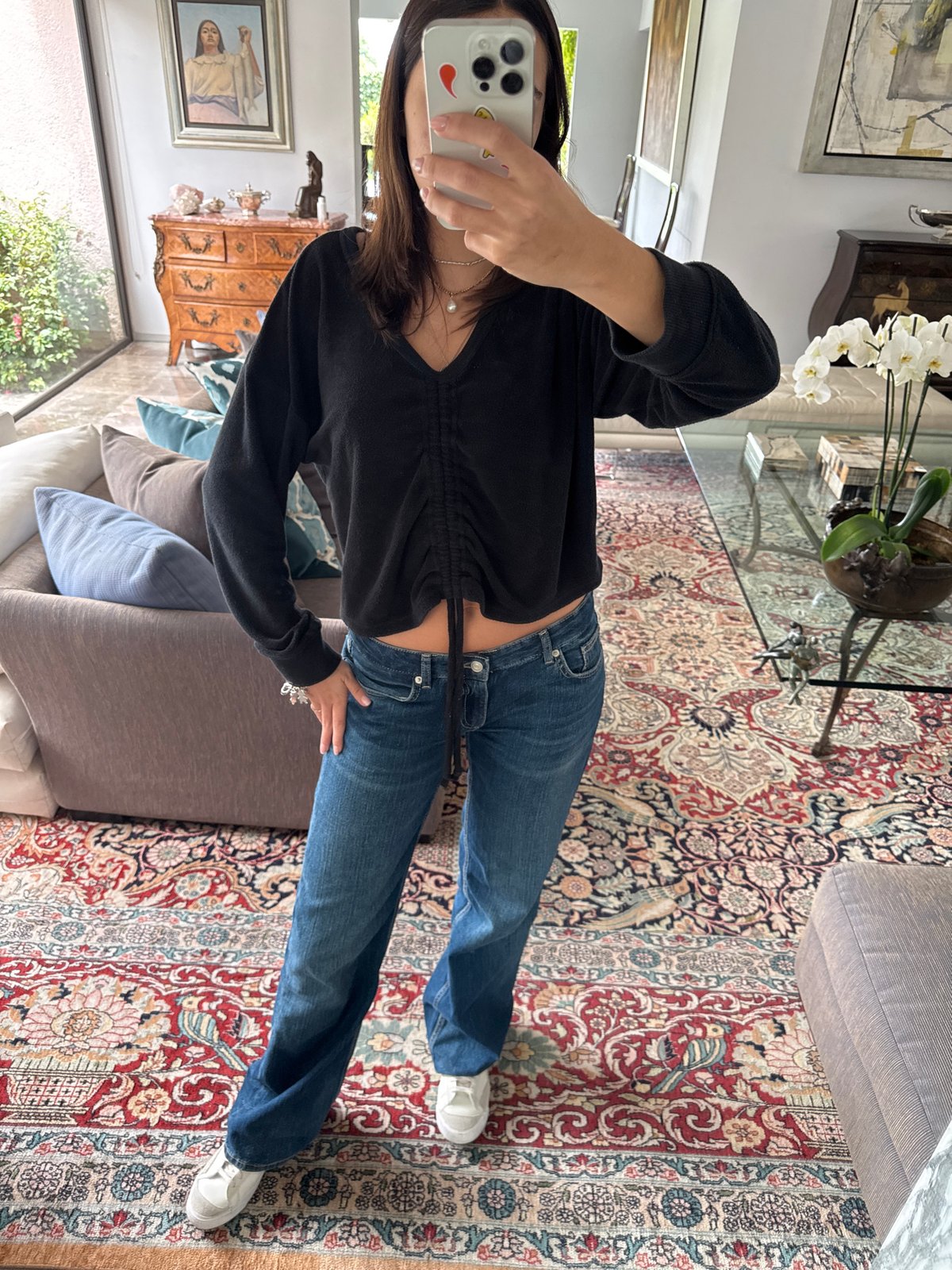 Woman takes selfie in Mexico City apartment building