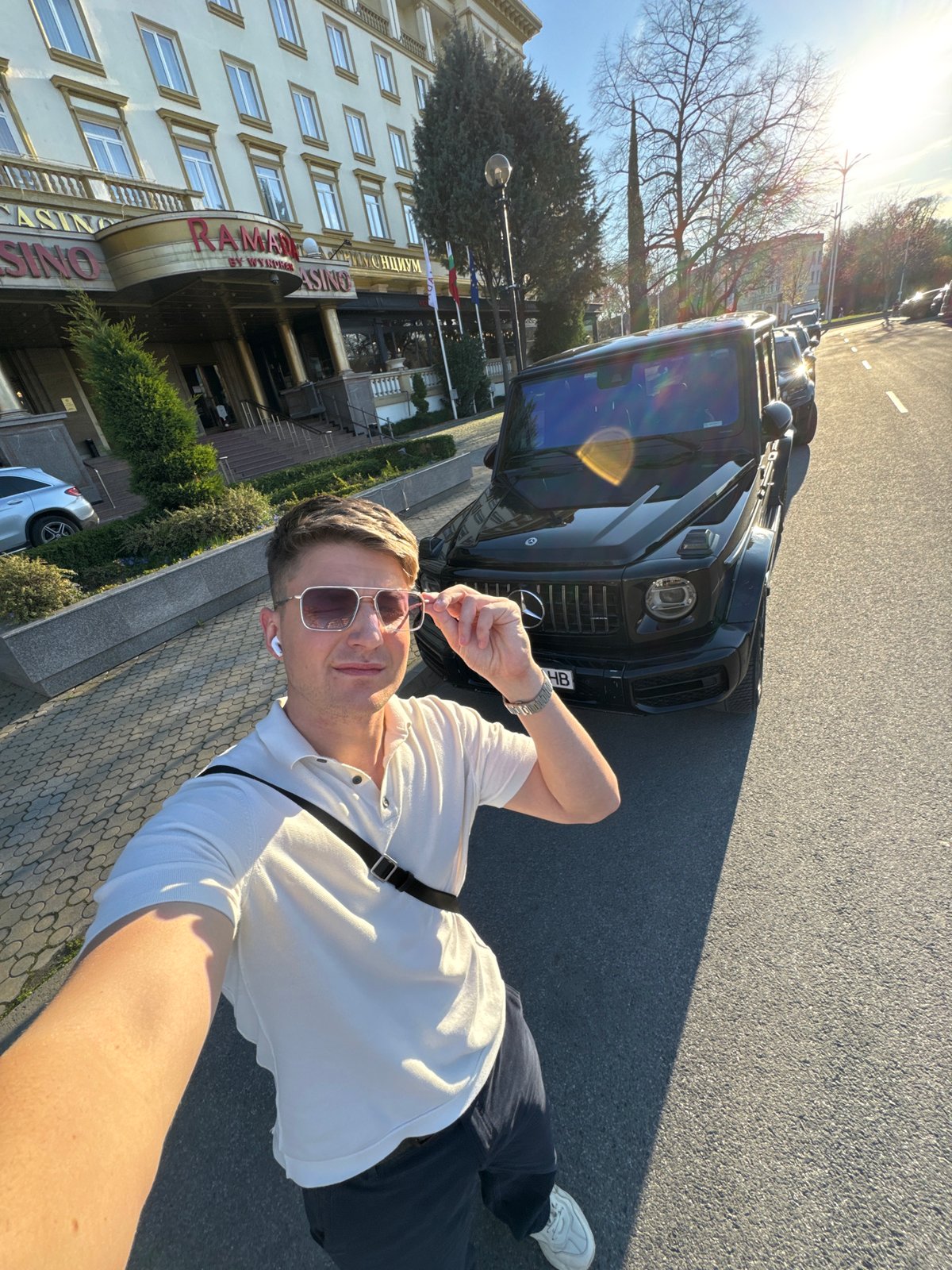 Tourist documents Plovdiv landmarks and Ford Mustang during Bulgaria visit