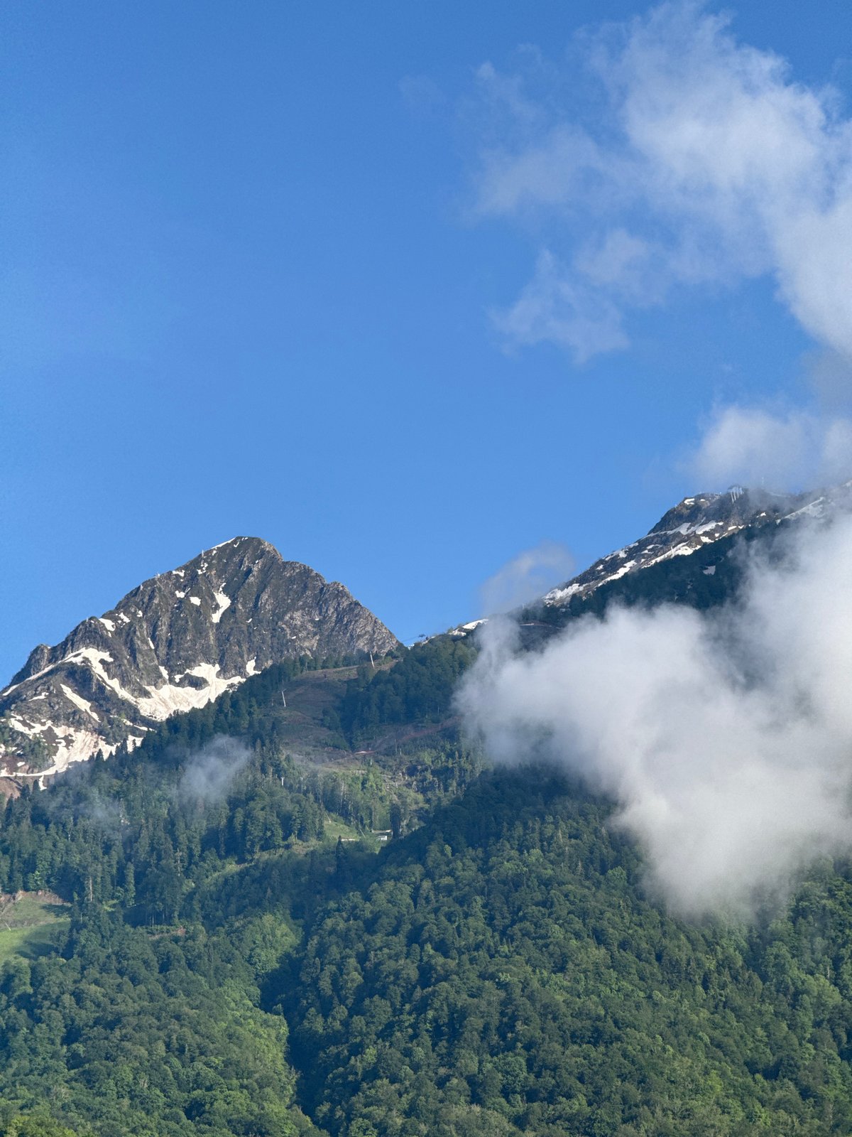 Witness captures mountain scenery and residential views in Krasnaya Polyana