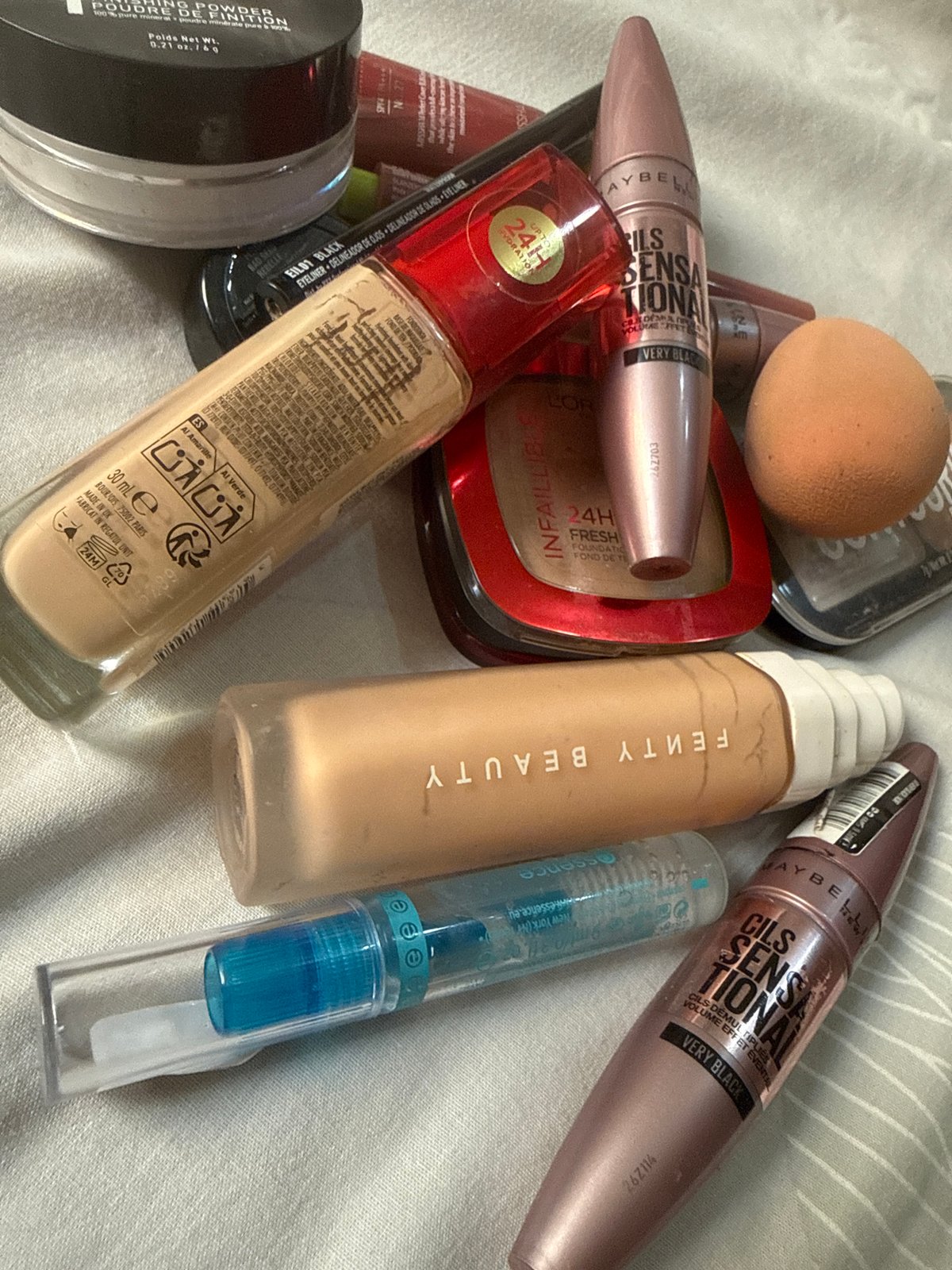 Makeup and skincare tools laid out and unboxed