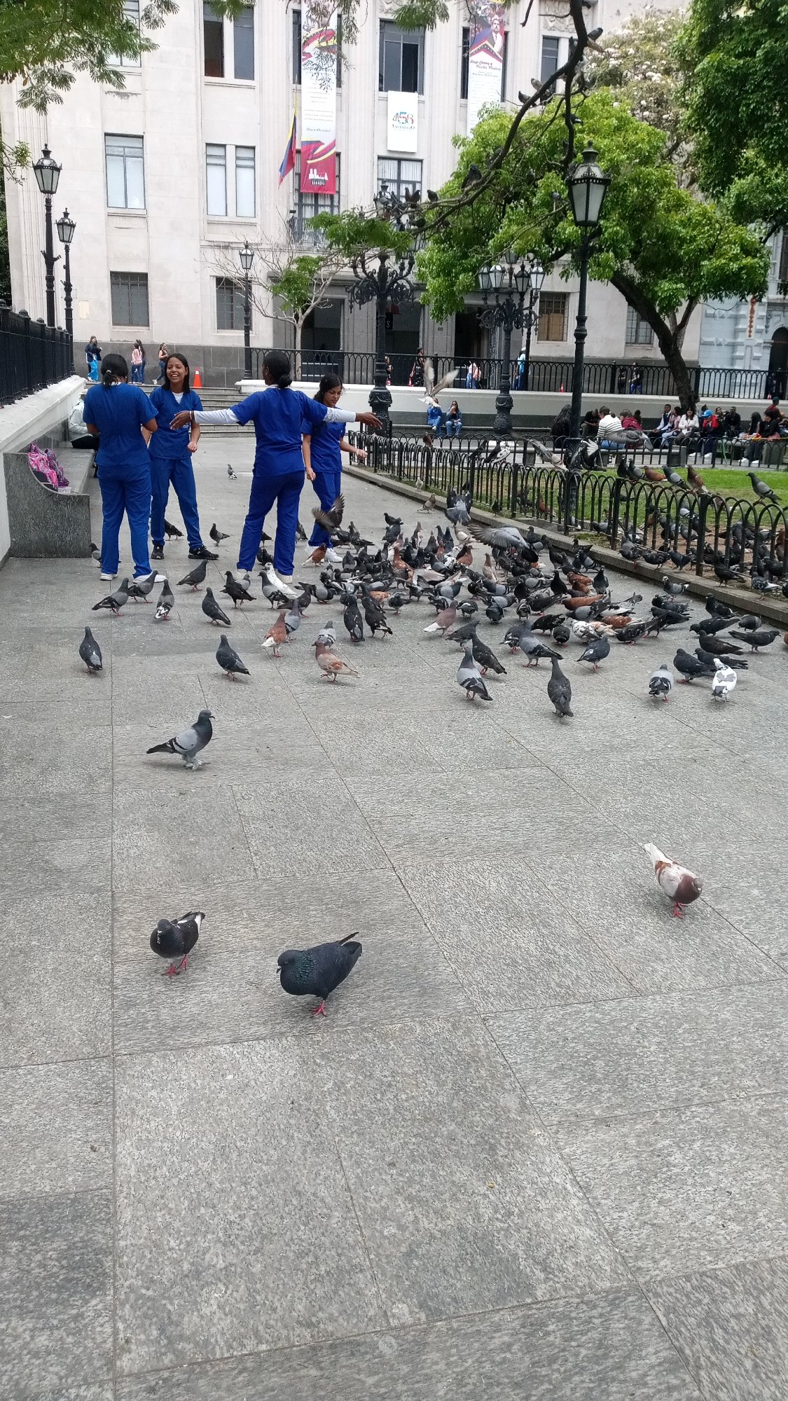 Urban street life documented across unknown city squares