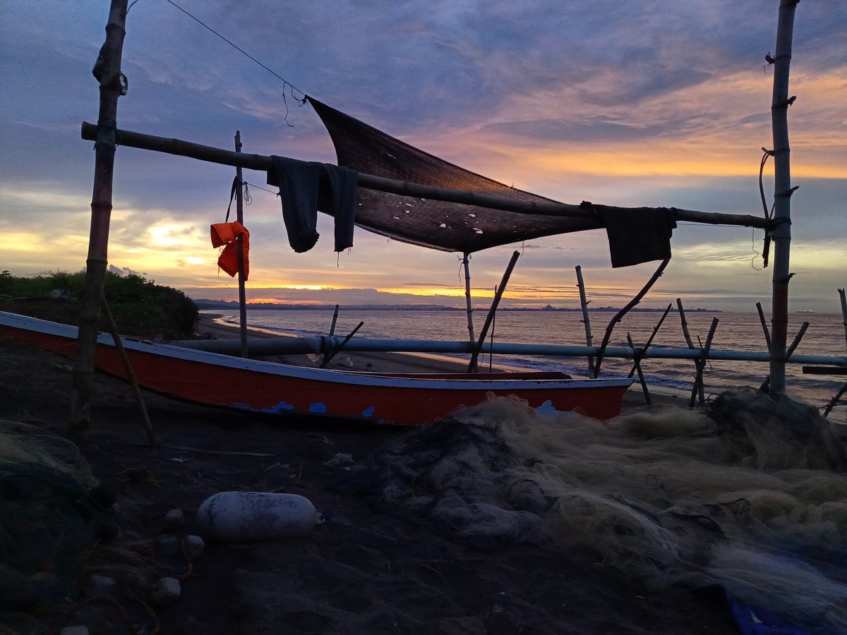 Dusk along Lhokseumawe's fishing and aquaculture coastline