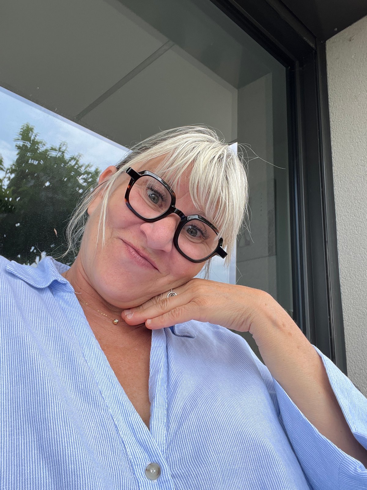 Woman takes selfie in Chambœuf, France