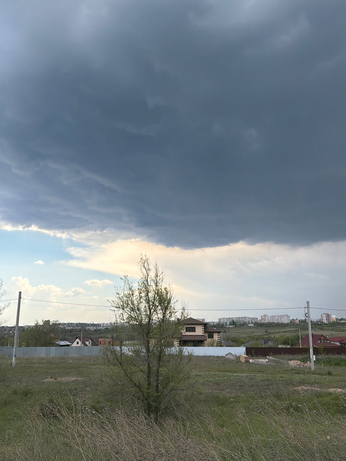 Dramatic storm clouds create stark weather contrast over Kamyshin