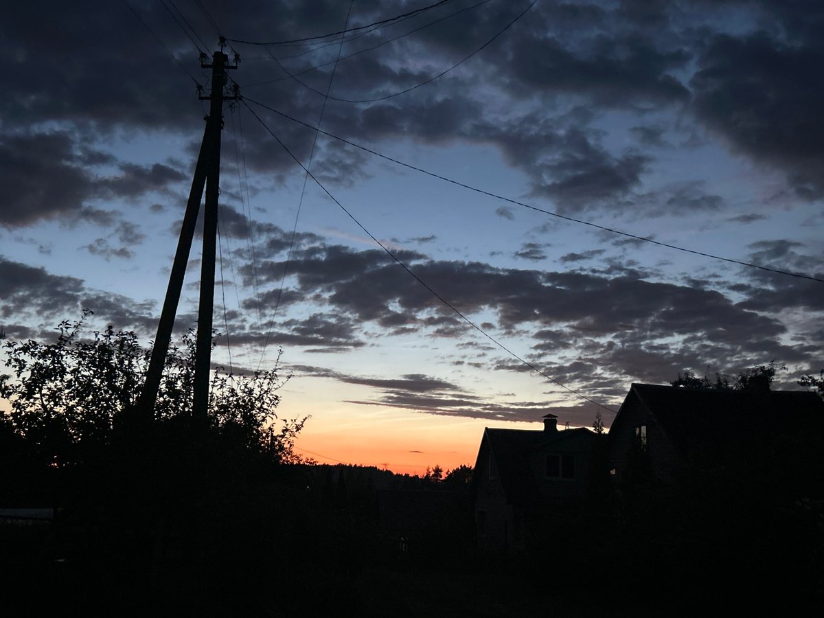 Belarus countryside garden at golden hour into dusk