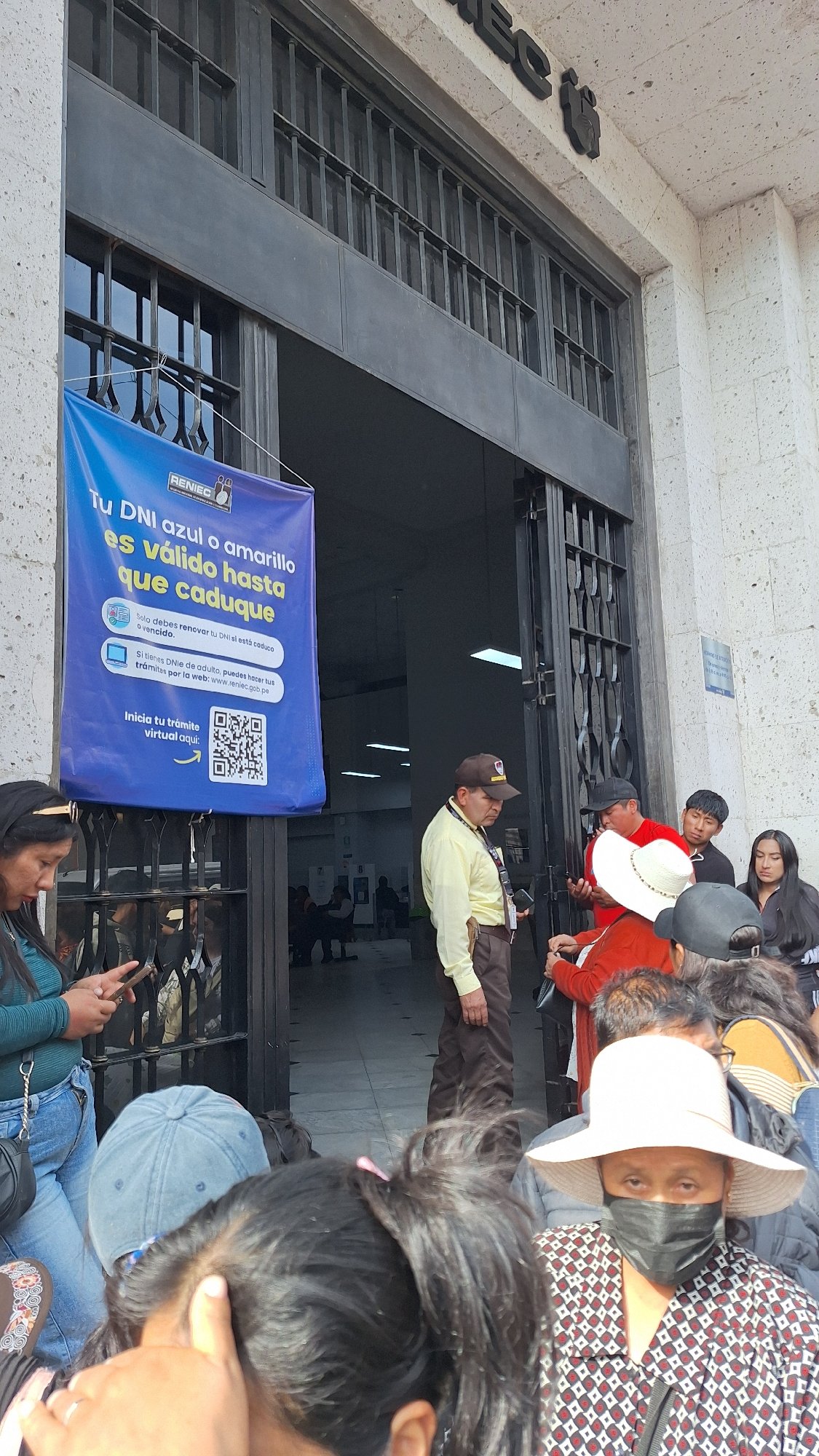 Political figure interviewed by reporters in Arequipa's Plaza de Armas