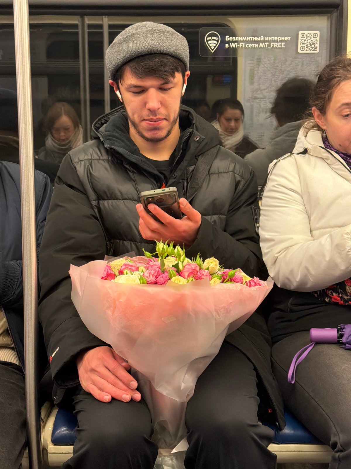 Passengers observed on Moscow subway during evening commute